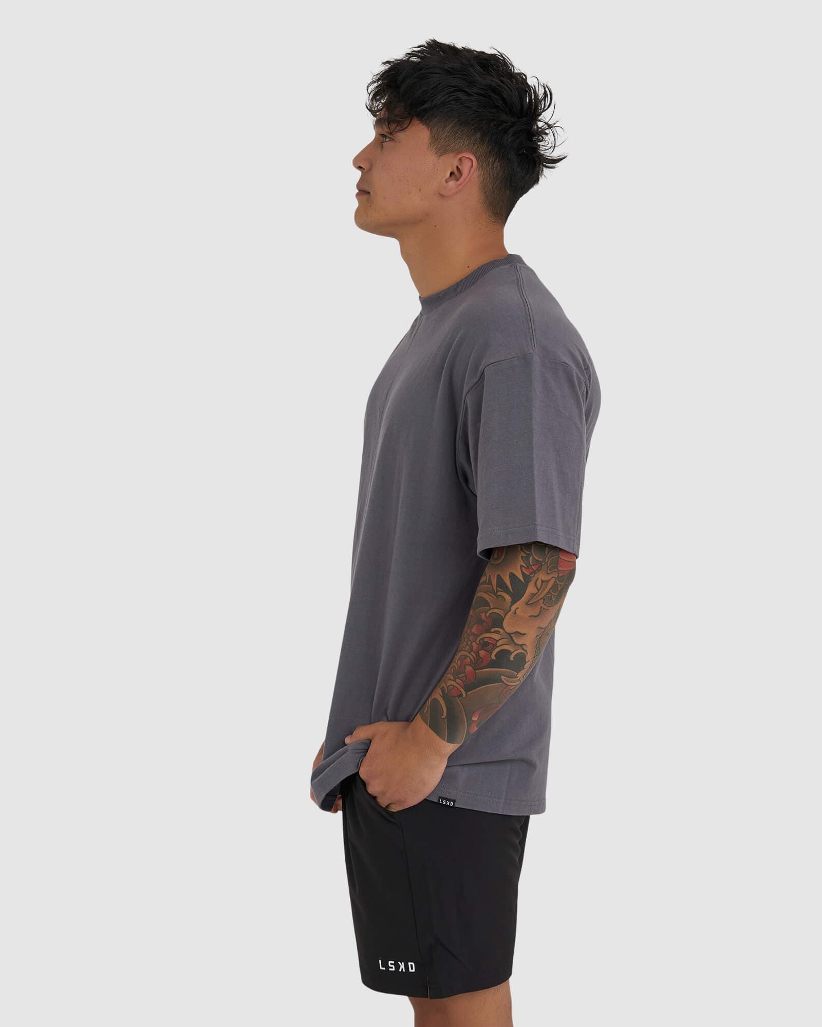 Model wearing Heavy Hitter Heavyweight Tee Oversize - Iron
