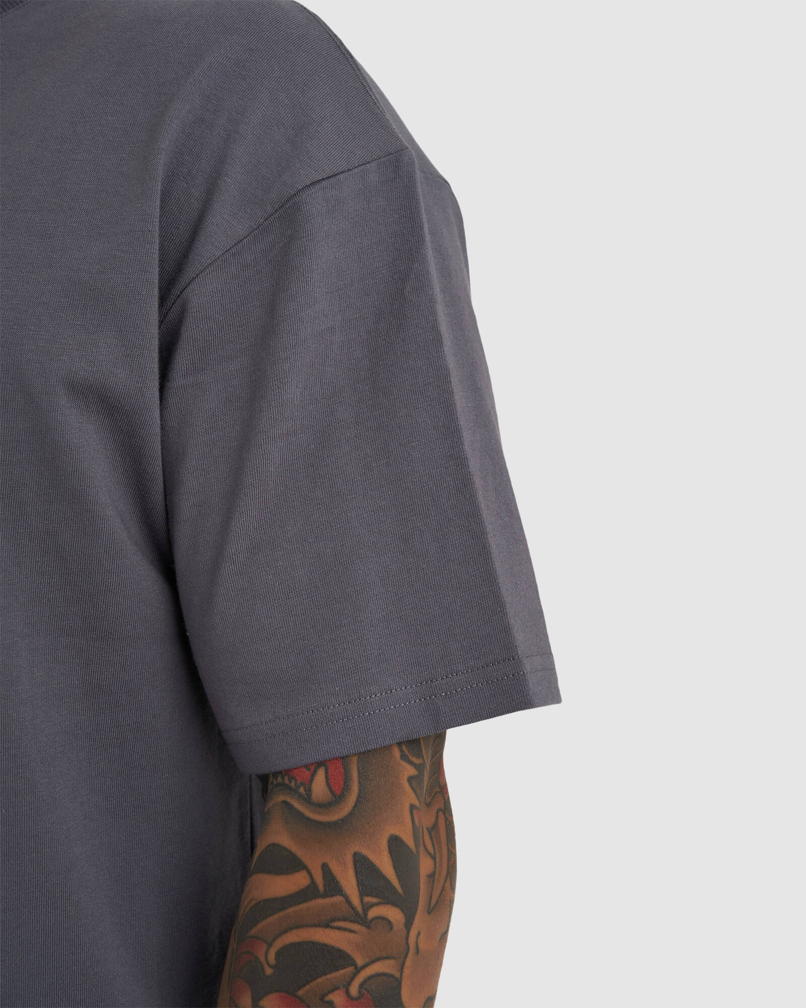 Model wearing Heavy Hitter Heavyweight Tee Oversize - Iron