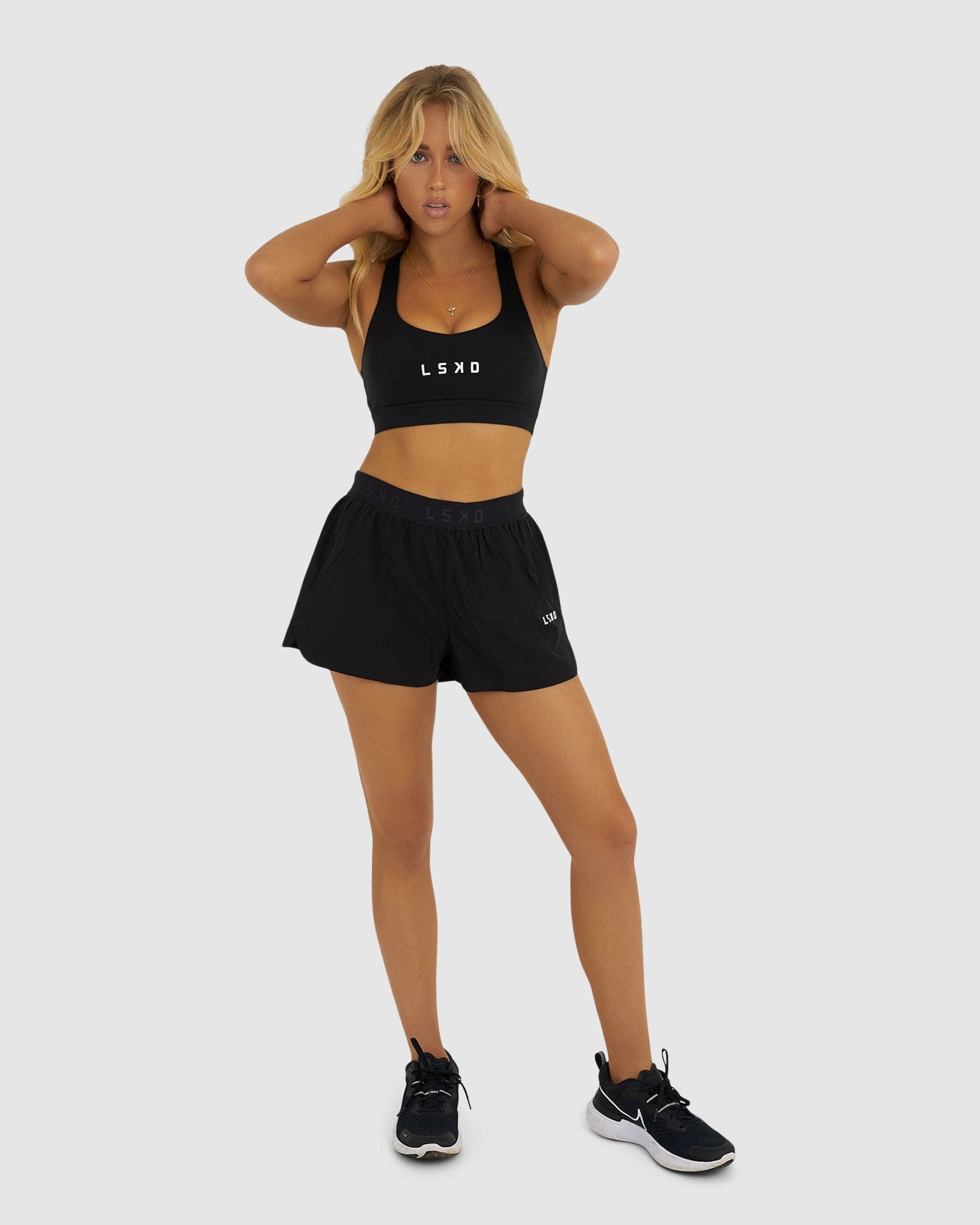 Model wearing Competition Performance Short - Black