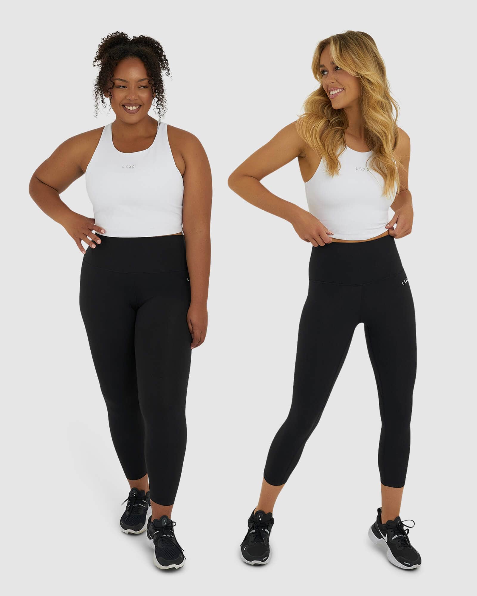 Model wearing Base Crop Tank - White