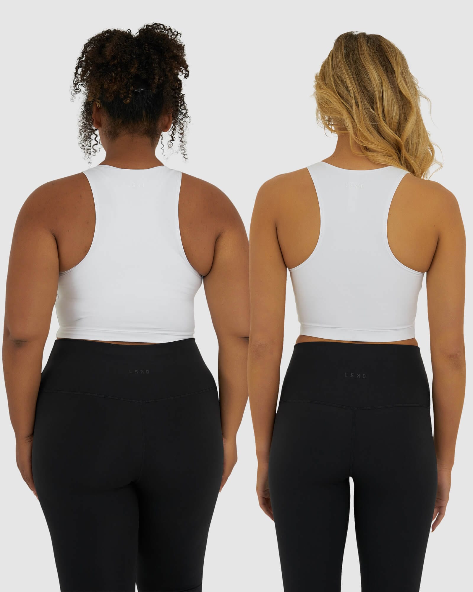 Model wearing Base Crop Tank - White