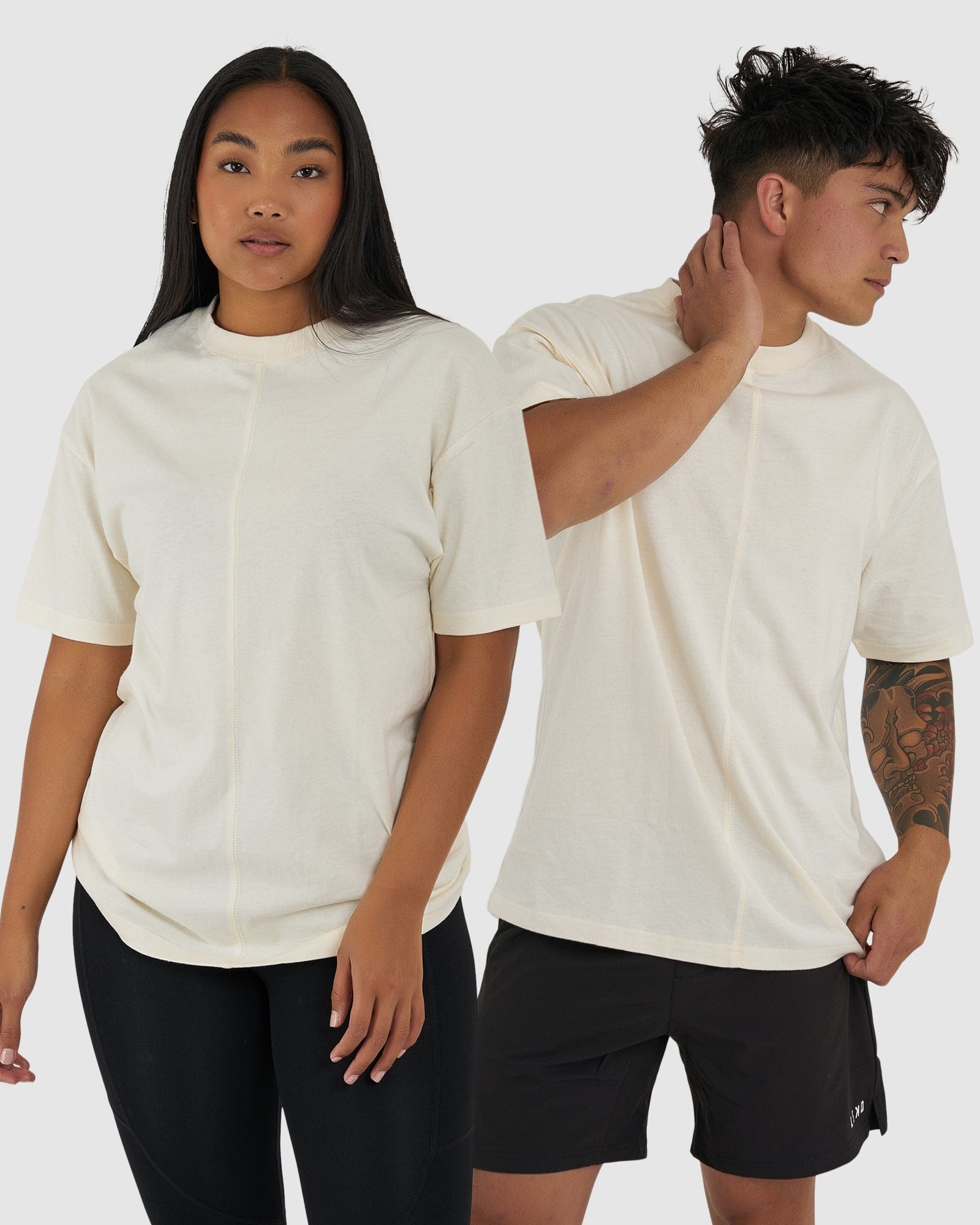 Model wearing Unisex Heavy Hitter Heavyweight Tee Oversize - Creme