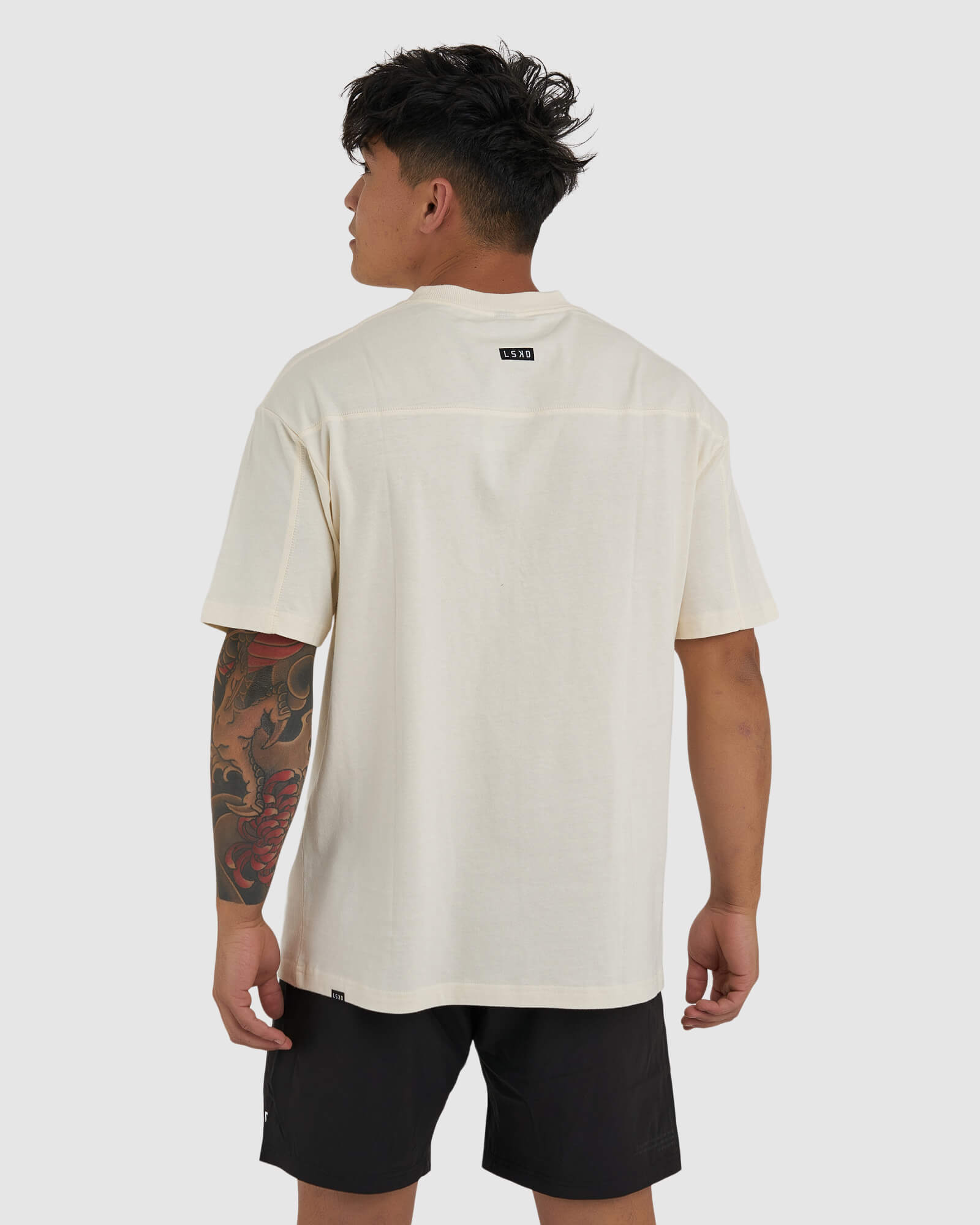 Model wearing Heavy Hitter Heavyweight Tee Oversize - Creme