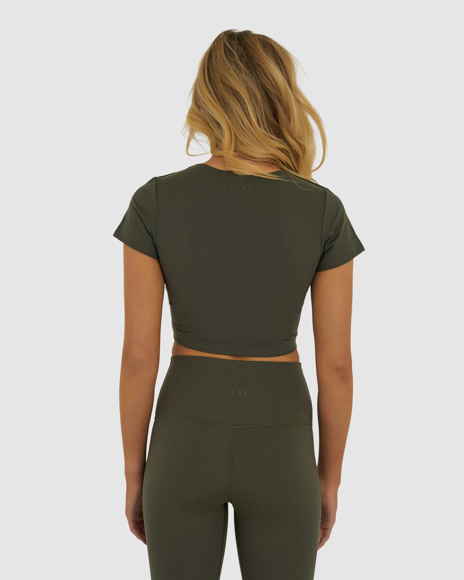 Model wearing Base Crop Tee - Forest Night