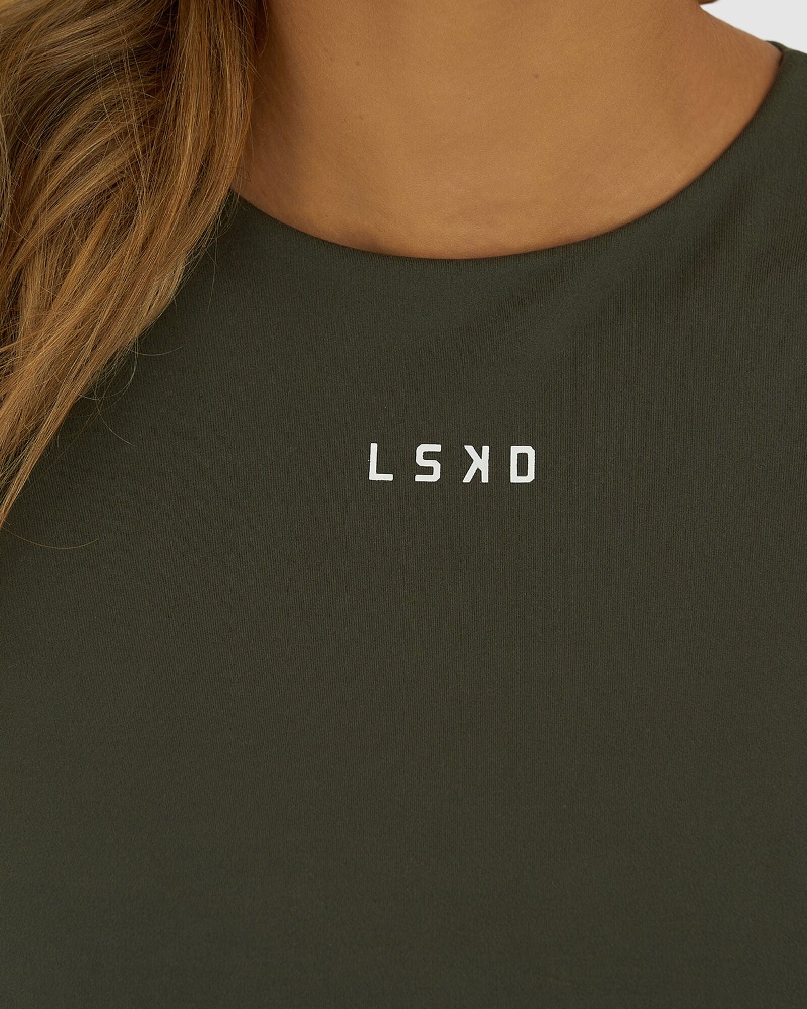 Model wearing Base Crop Tee - Forest Night