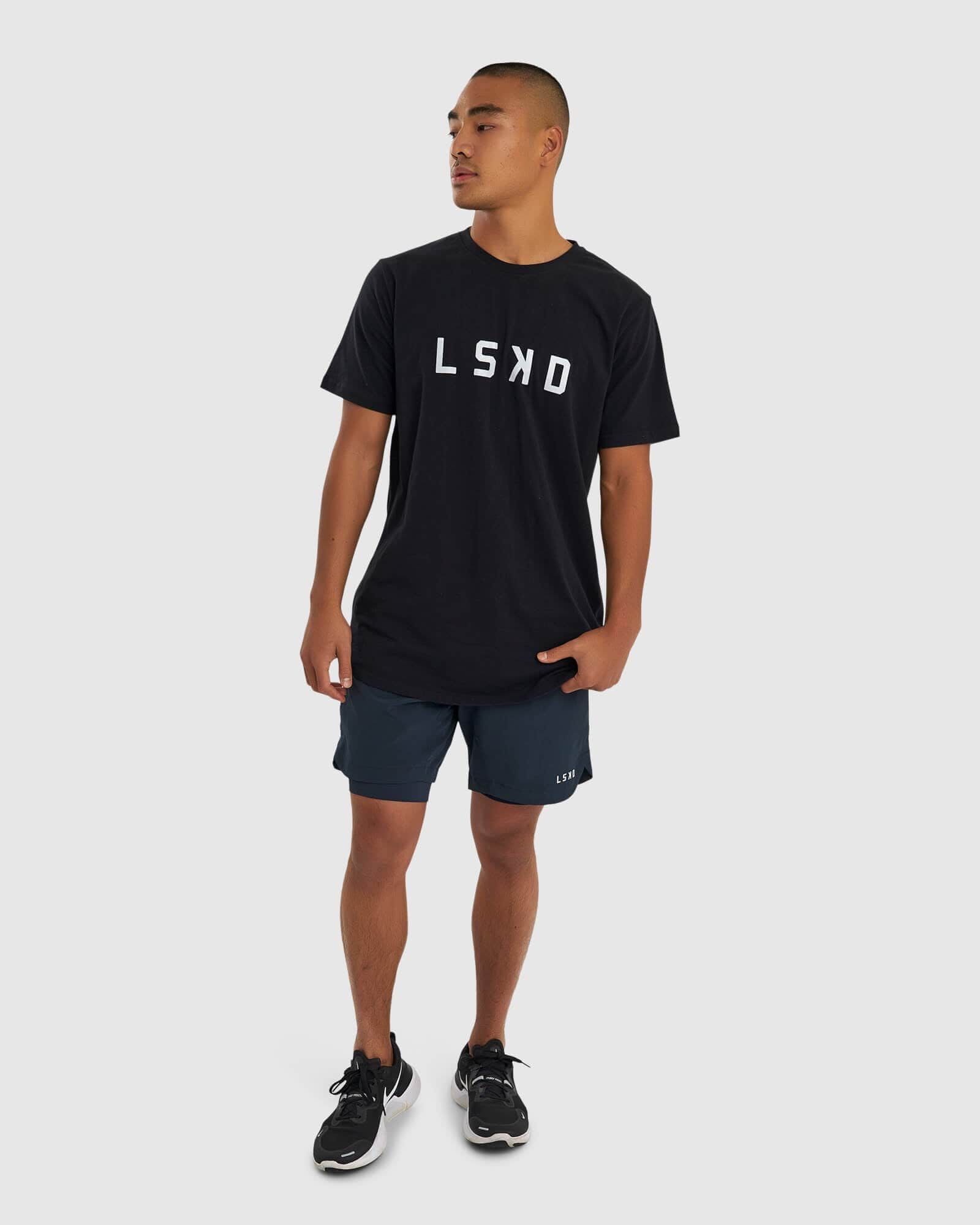 Model wearing Power 7" Performance Liner Short - Carbon