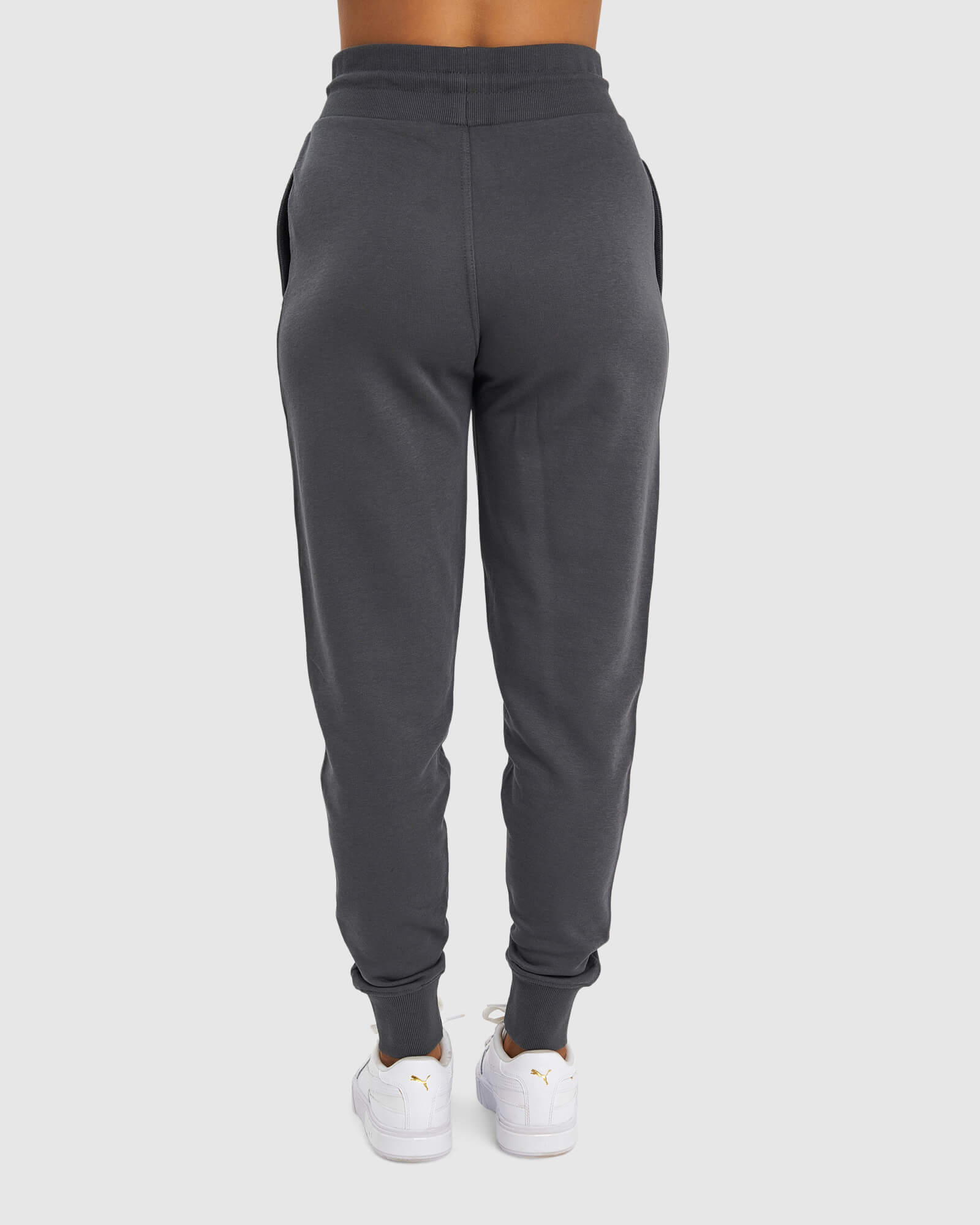 Model wearing Unisex Locker Room Track Pant - Iron
