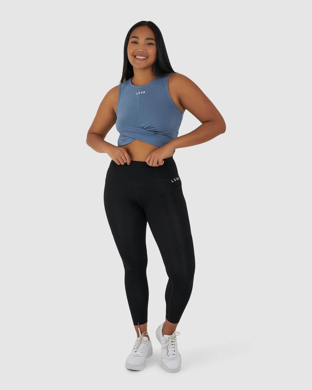 Model wearing Twist Tank - Lt Carbon