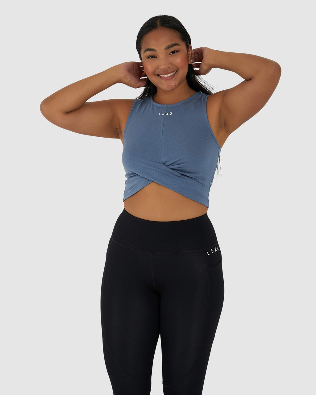 Model wearing Twist Tank - Lt Carbon