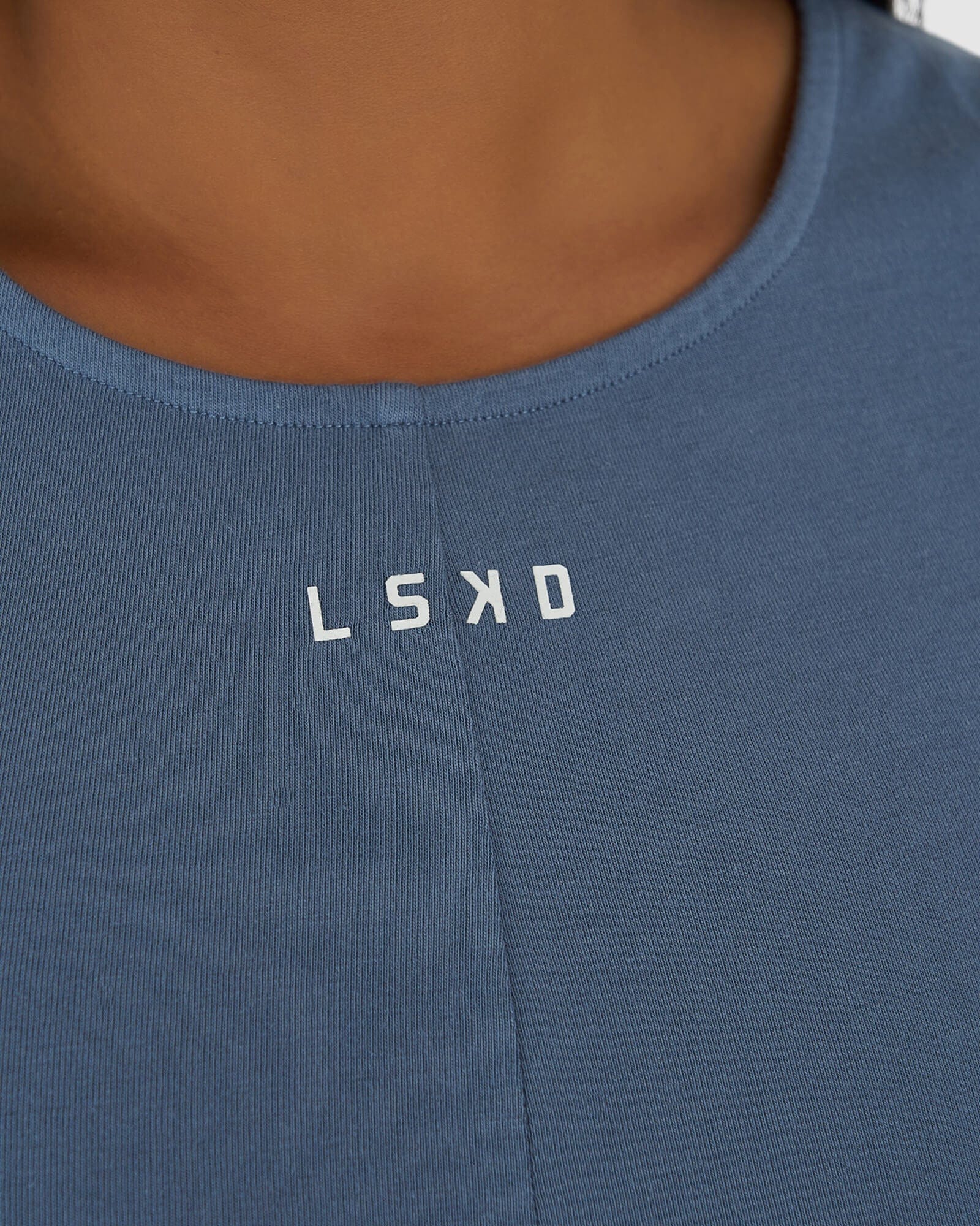 Model wearing Twist Tank - Lt Carbon