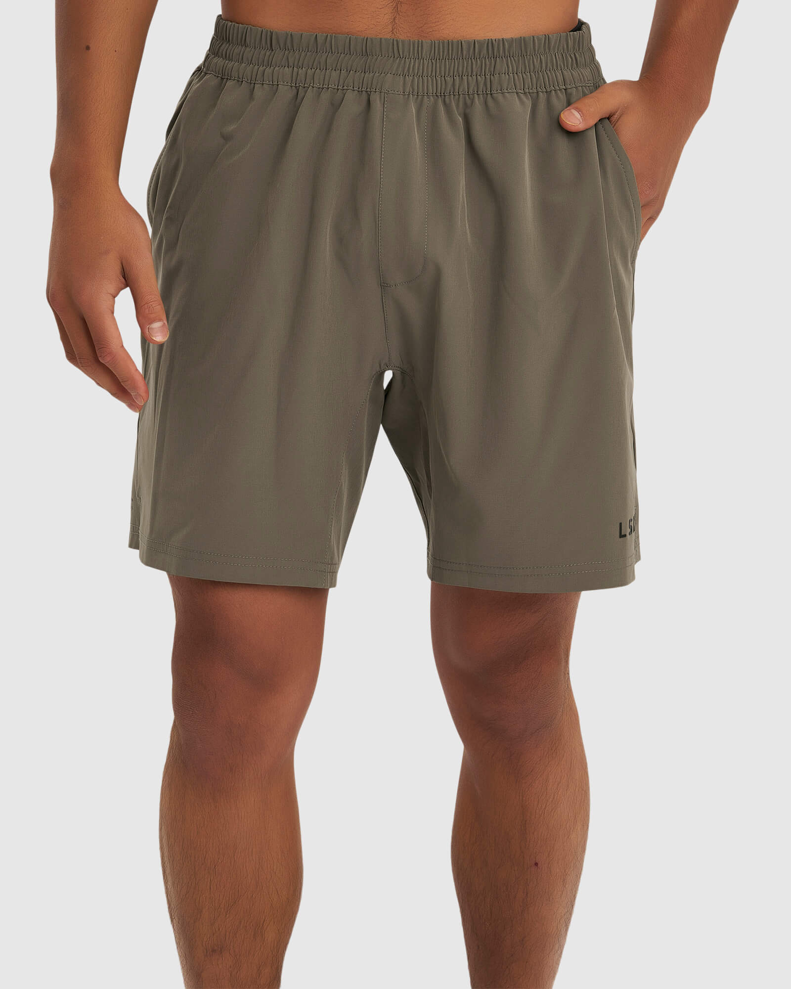 Model wearing Intensity 7" Performance Short - Walnut Grey