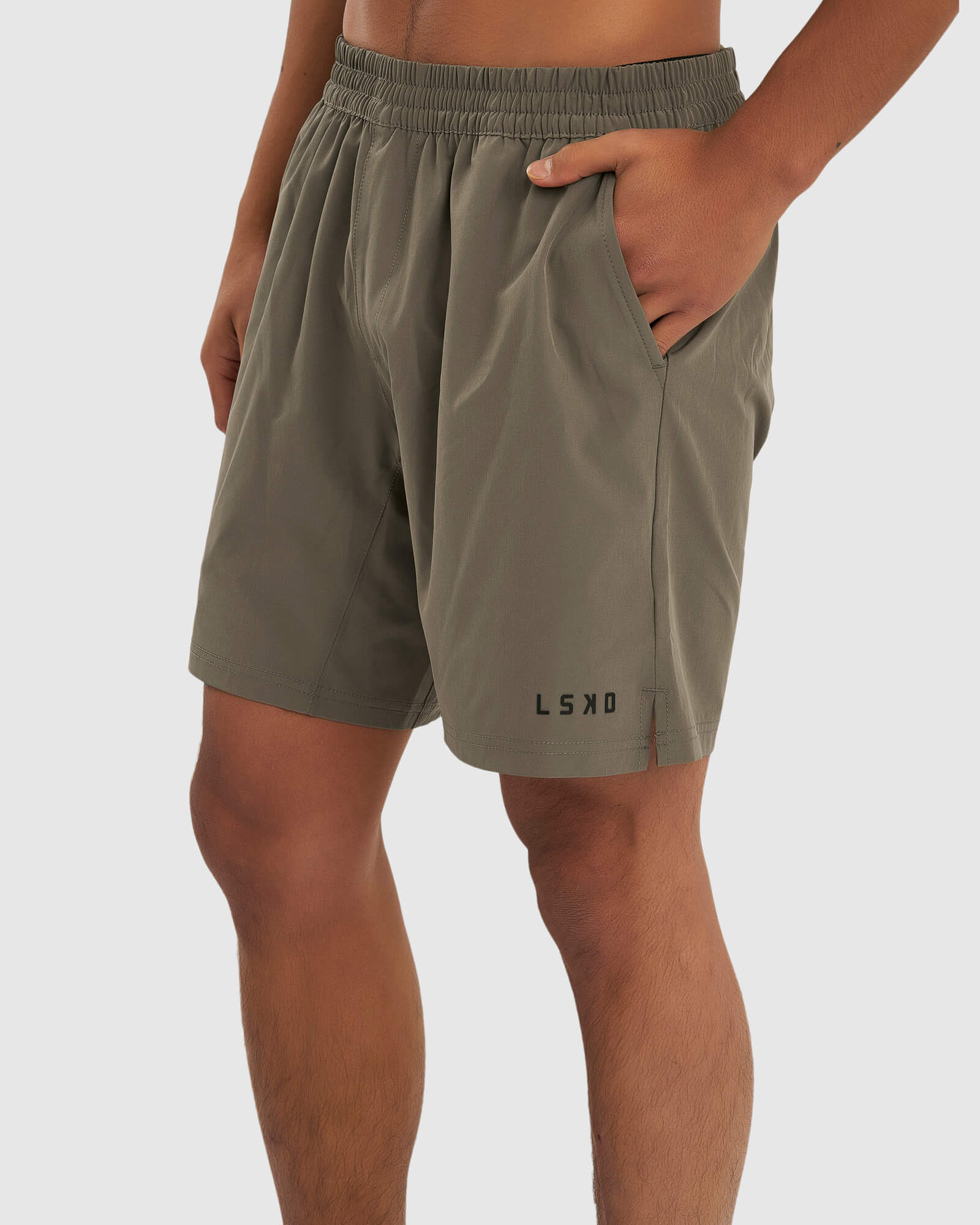 Model wearing Intensity 7" Performance Short - Walnut Grey