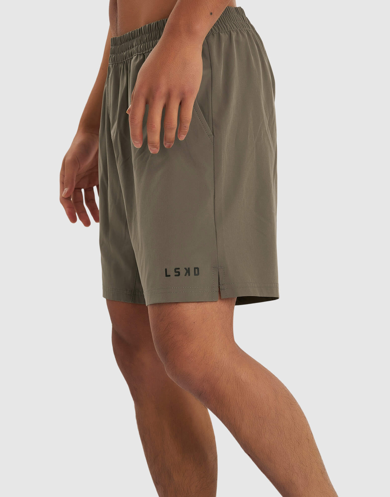 Model wearing Intensity 7" Performance Short - Walnut Grey