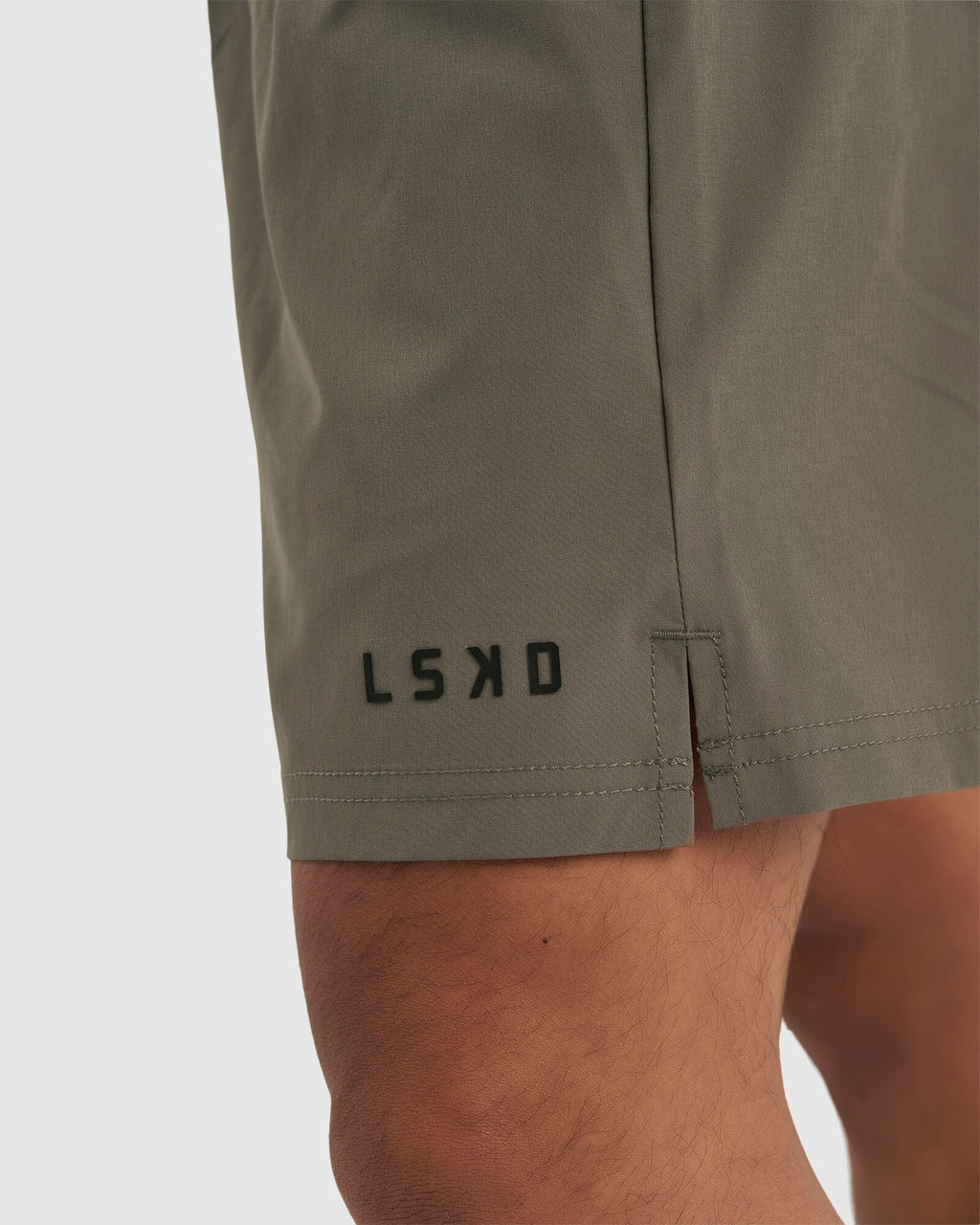 Model wearing Intensity 7" Performance Short - Walnut Grey