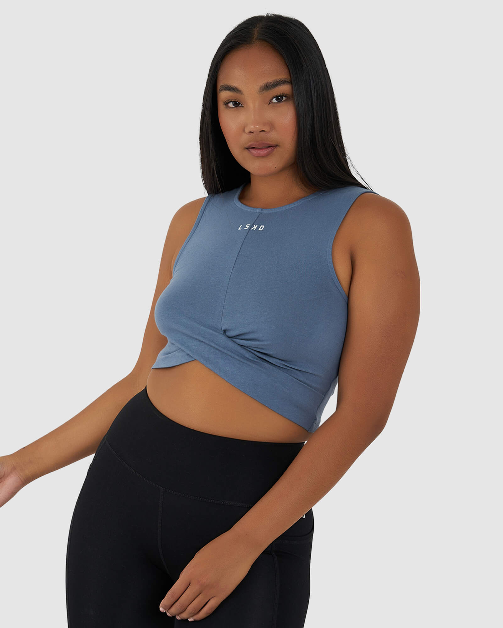 Model wearing Twist Tank - Lt Carbon