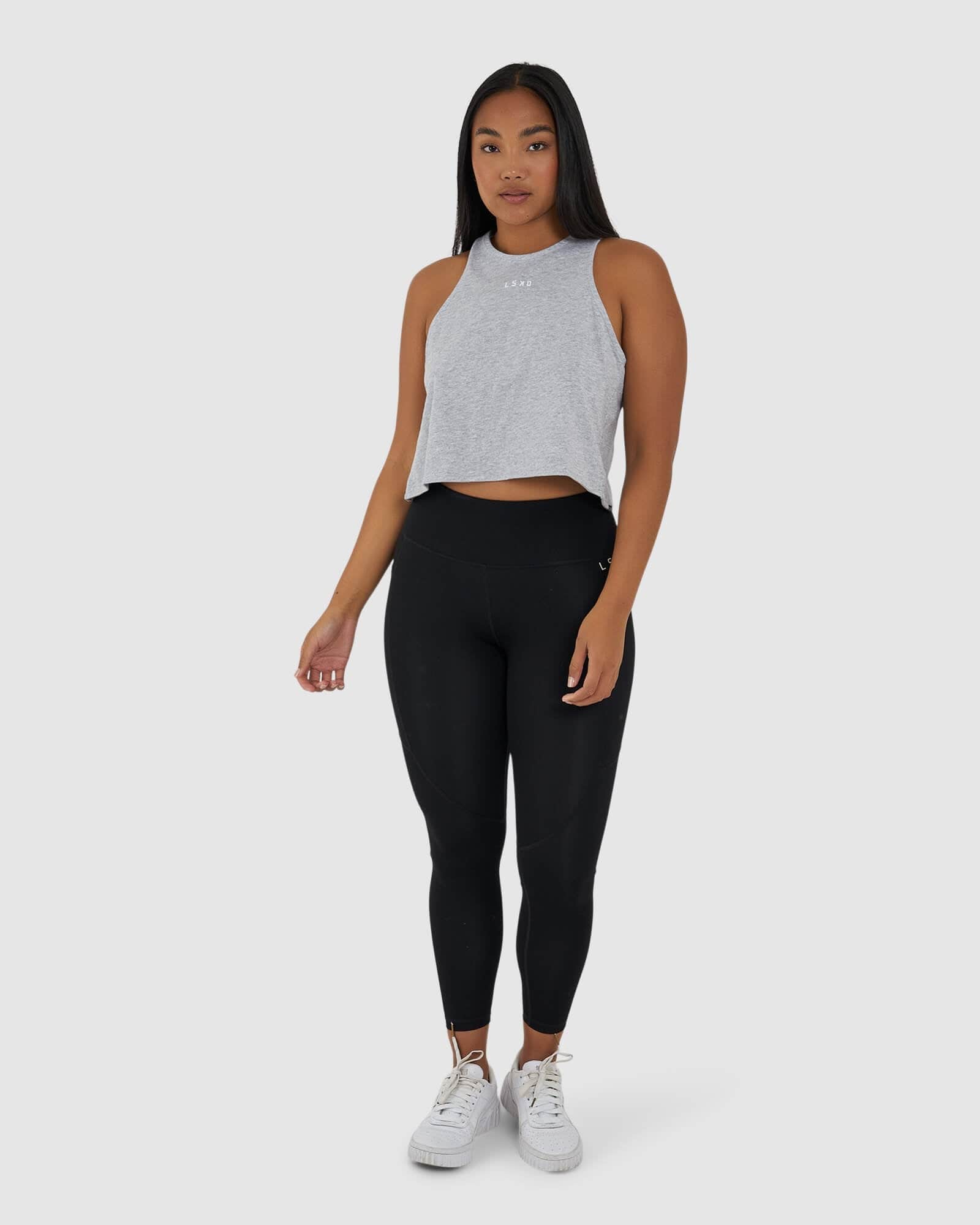 Model wearing Icon Crossover Tank - Lt Grey Marl