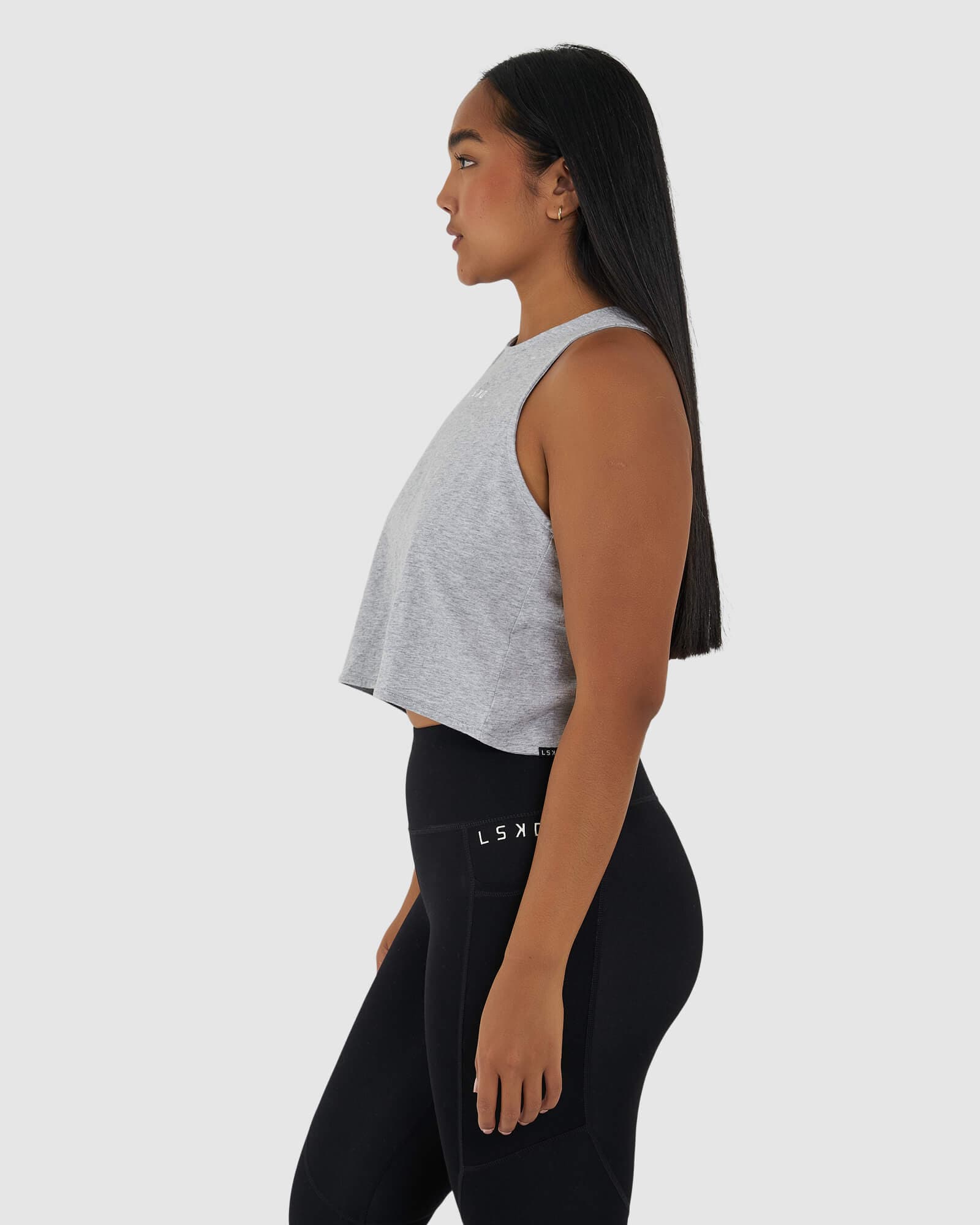 Model wearing Icon Crossover Tank - Lt Grey Marl