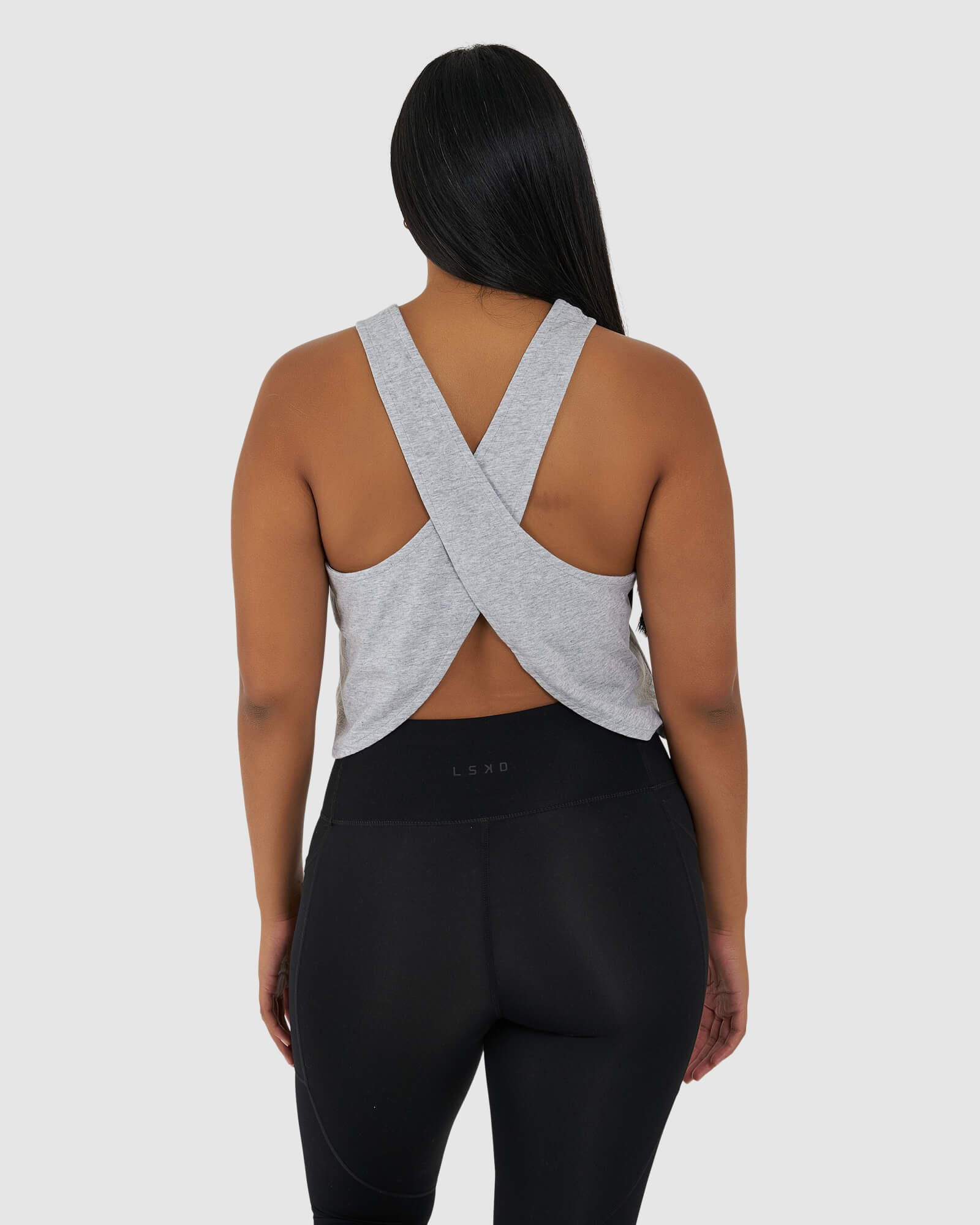 Model wearing Icon Crossover Tank - Lt Grey Marl