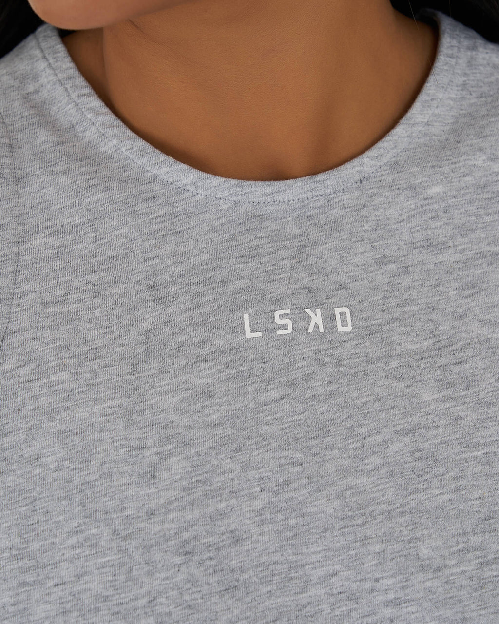 Model wearing Icon Crossover Tank - Lt Grey Marl