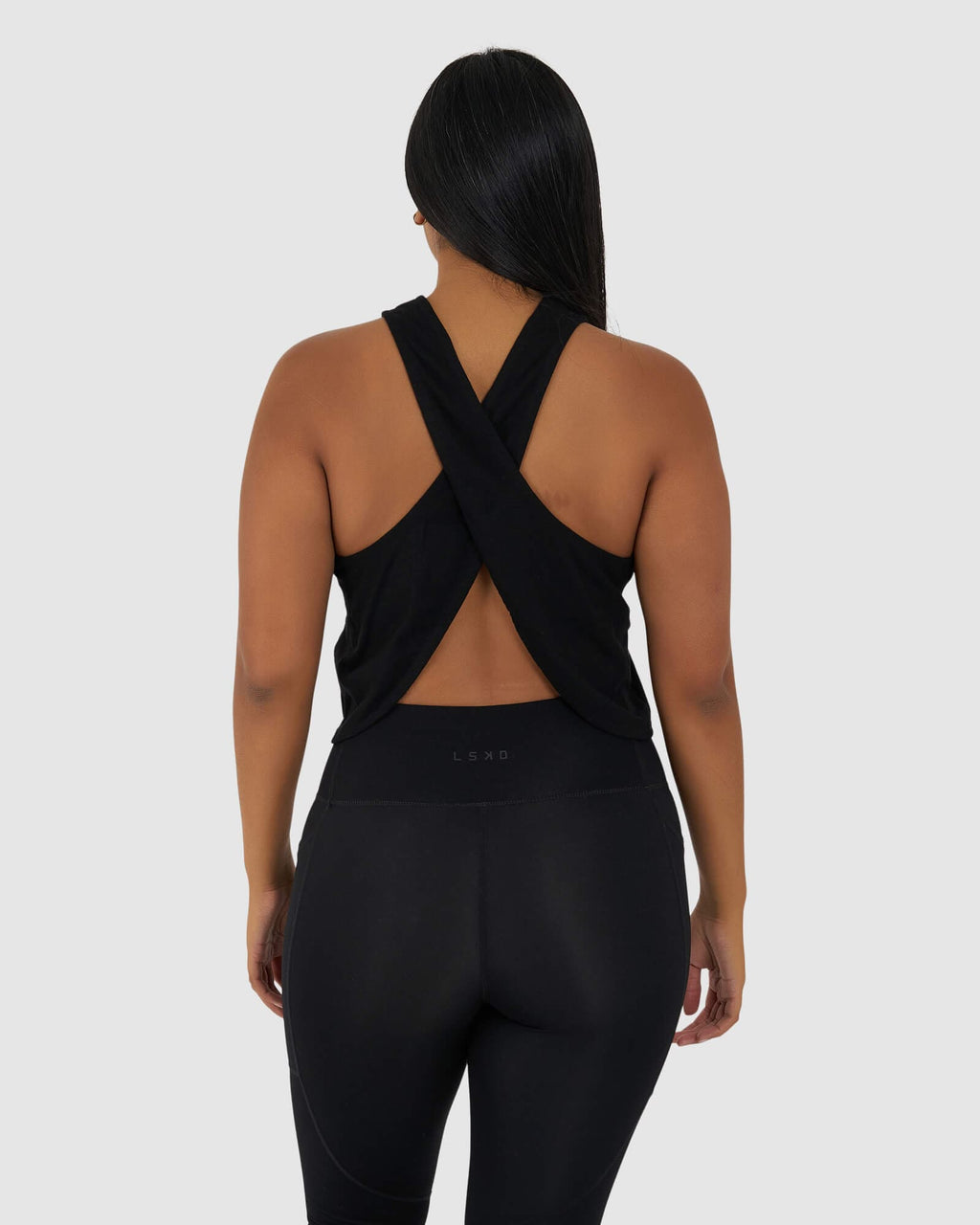 Model wearing Icon Crossover Tank - Black