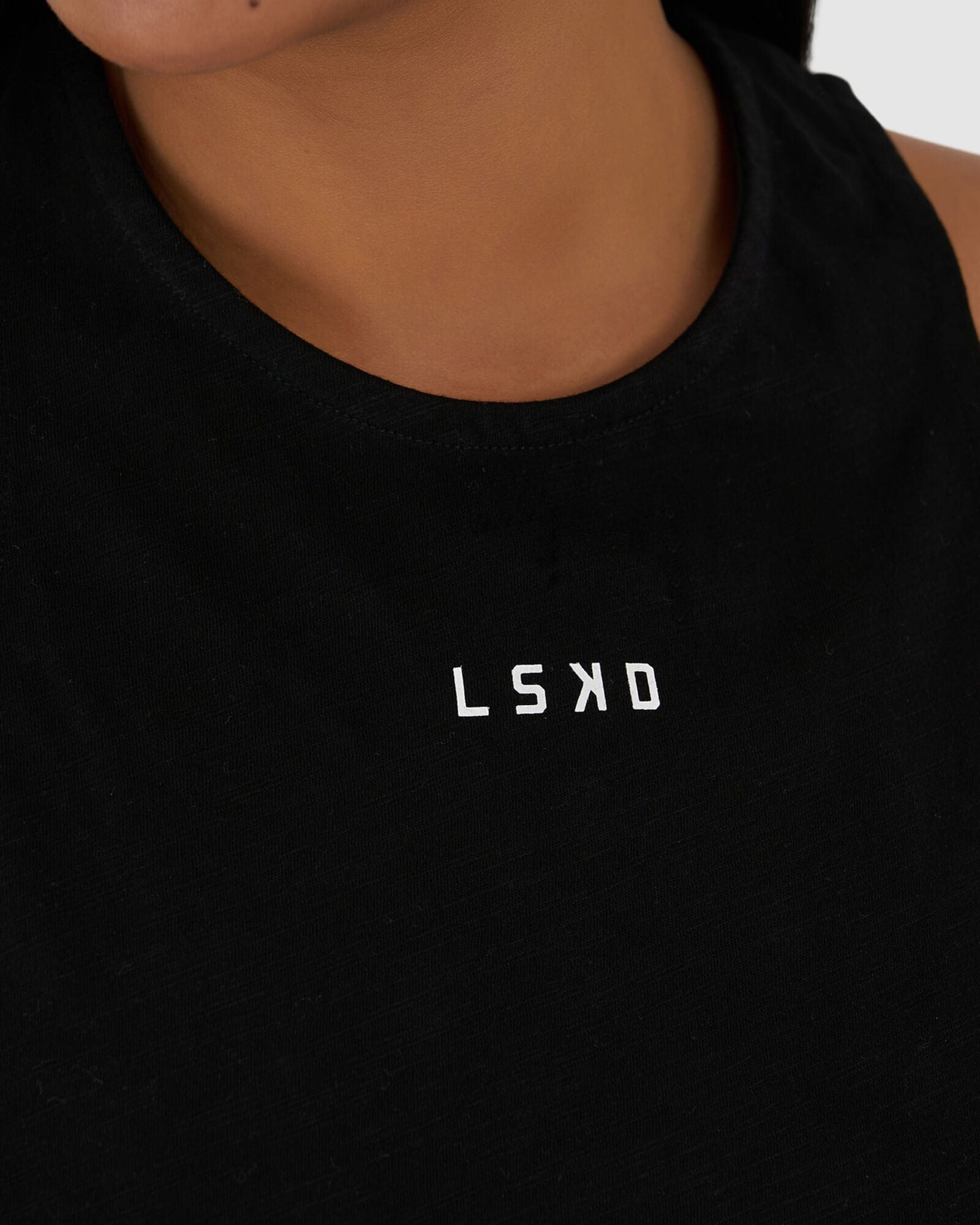 Model wearing Icon Crossover Tank - Black