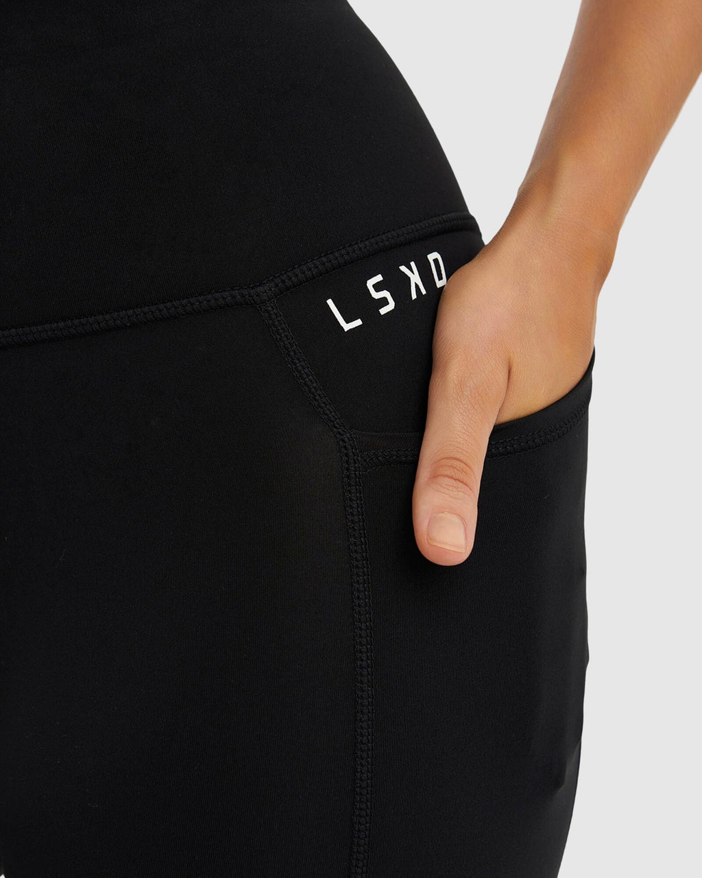 Model wearing Dash 7/8 Length Tight - Black-White