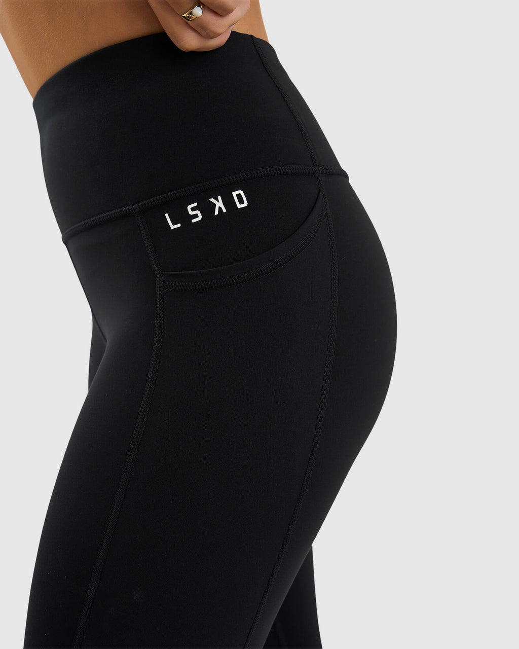 Model wearing Dash 7/8 Length Tight - Black-White