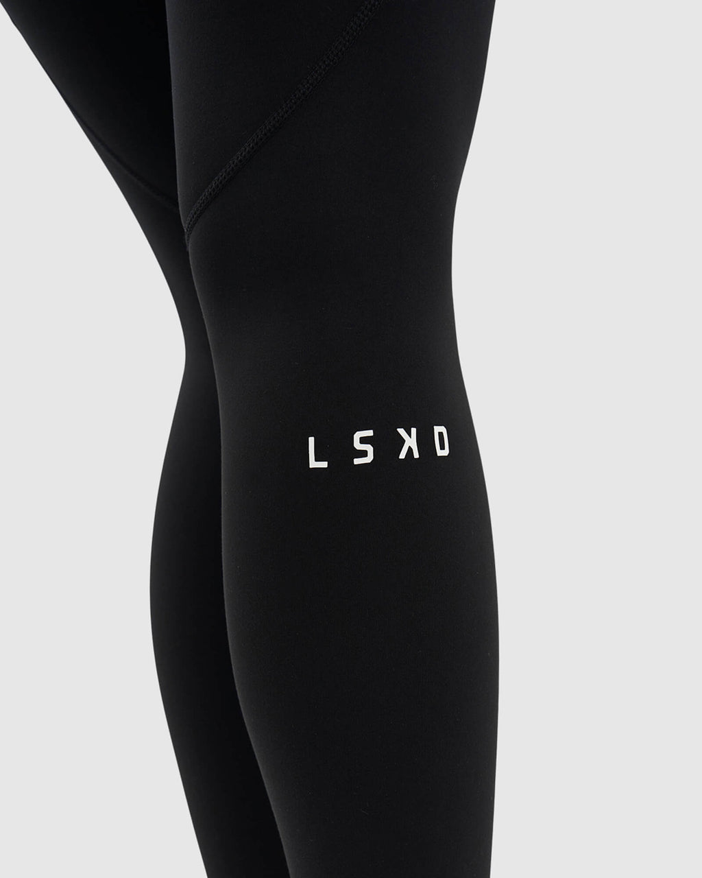 Model wearing Dash 7/8 Length Tight - Black-White