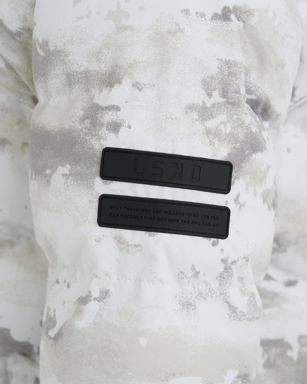 Model wearing Roasted Puffer Jacket 21 - Snow Camo