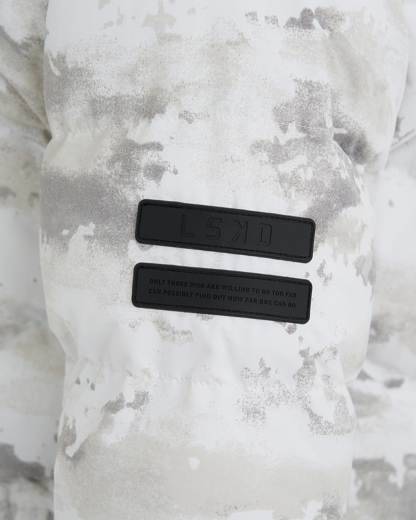 Model wearing Roasted Puffer Jacket 21 - Snow Camo