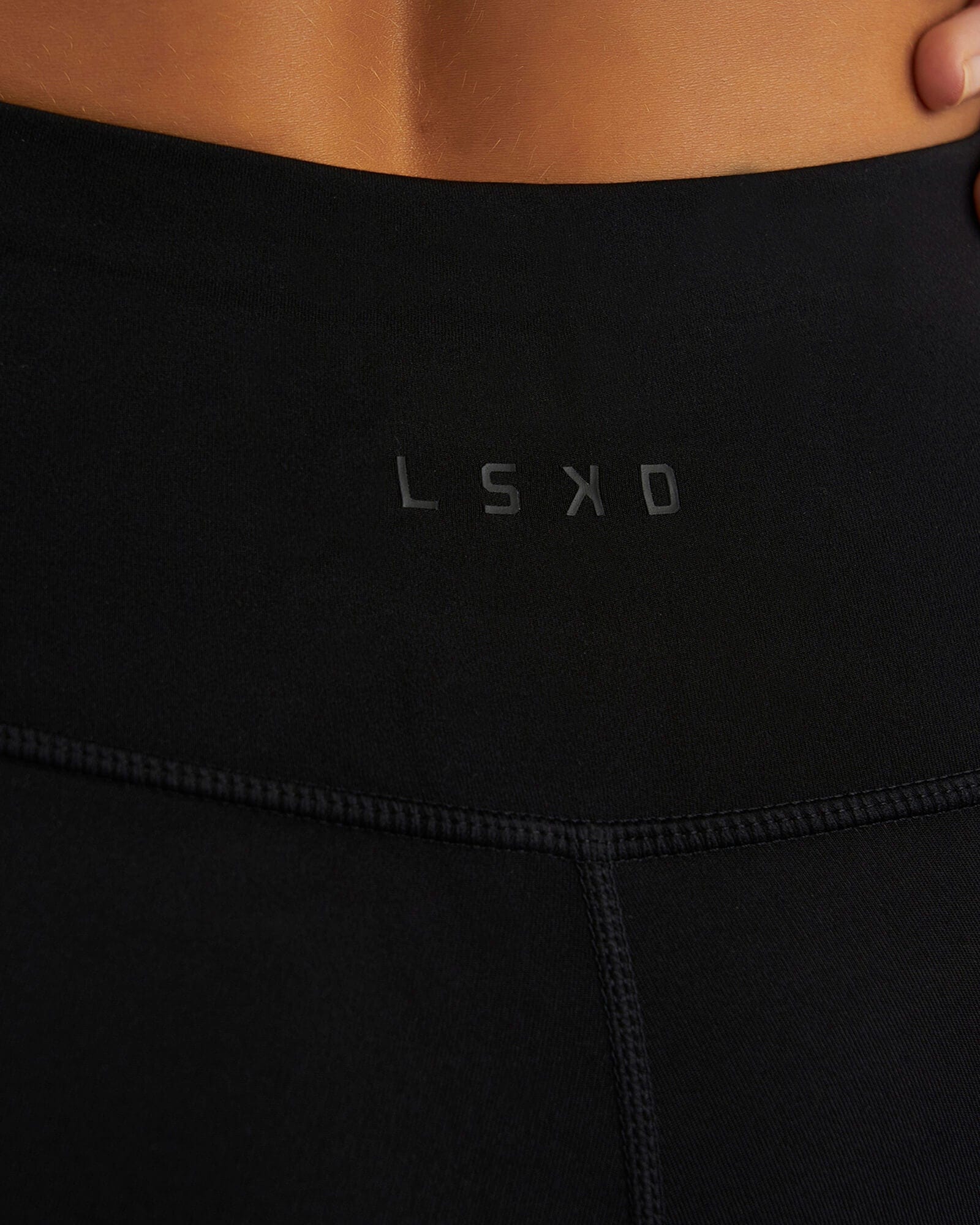 Model wearing Dash 7/8 Length Tight - Black-White