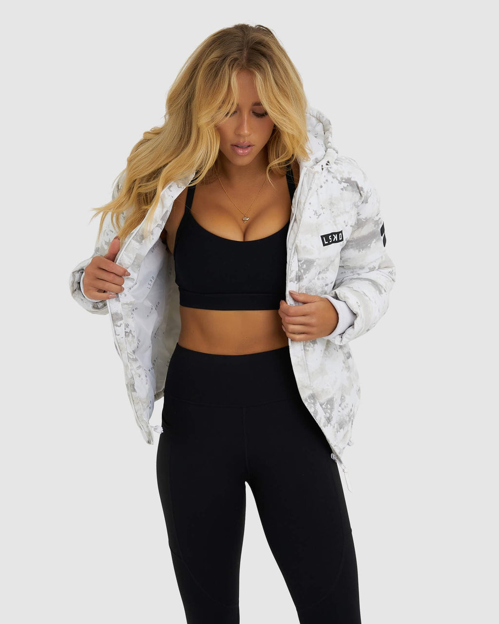 Model wearing Roasted Puffer Jacket 21 - Snow Camo