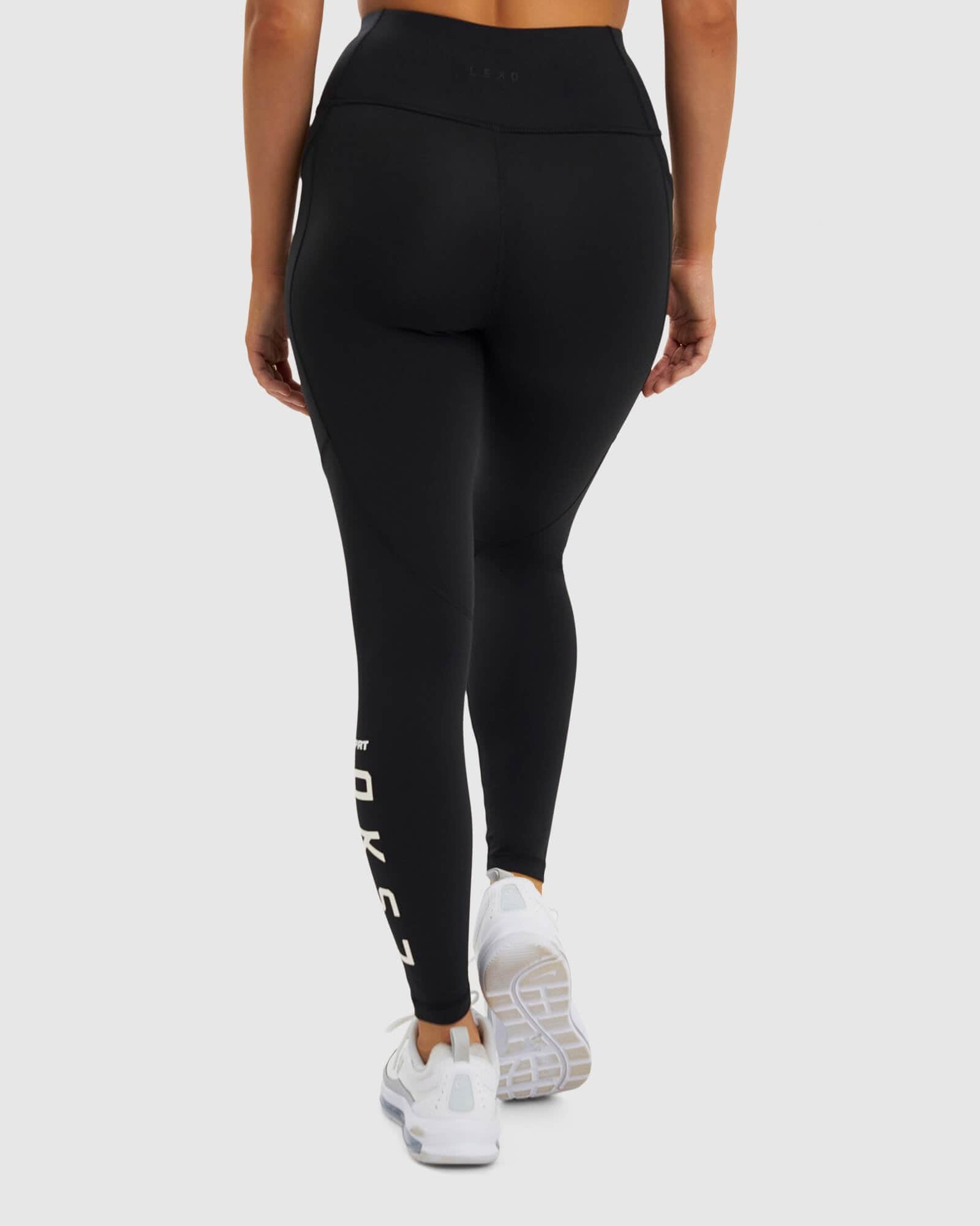 Model wearing SPRT Full Length Tight - Black-White