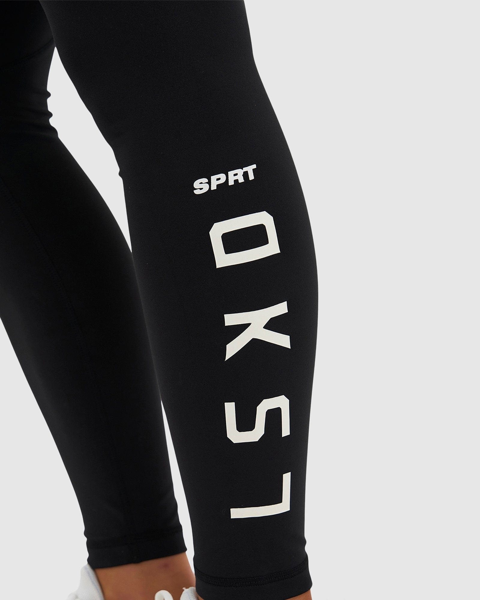 Model wearing SPRT Full Length Tight - Black-White