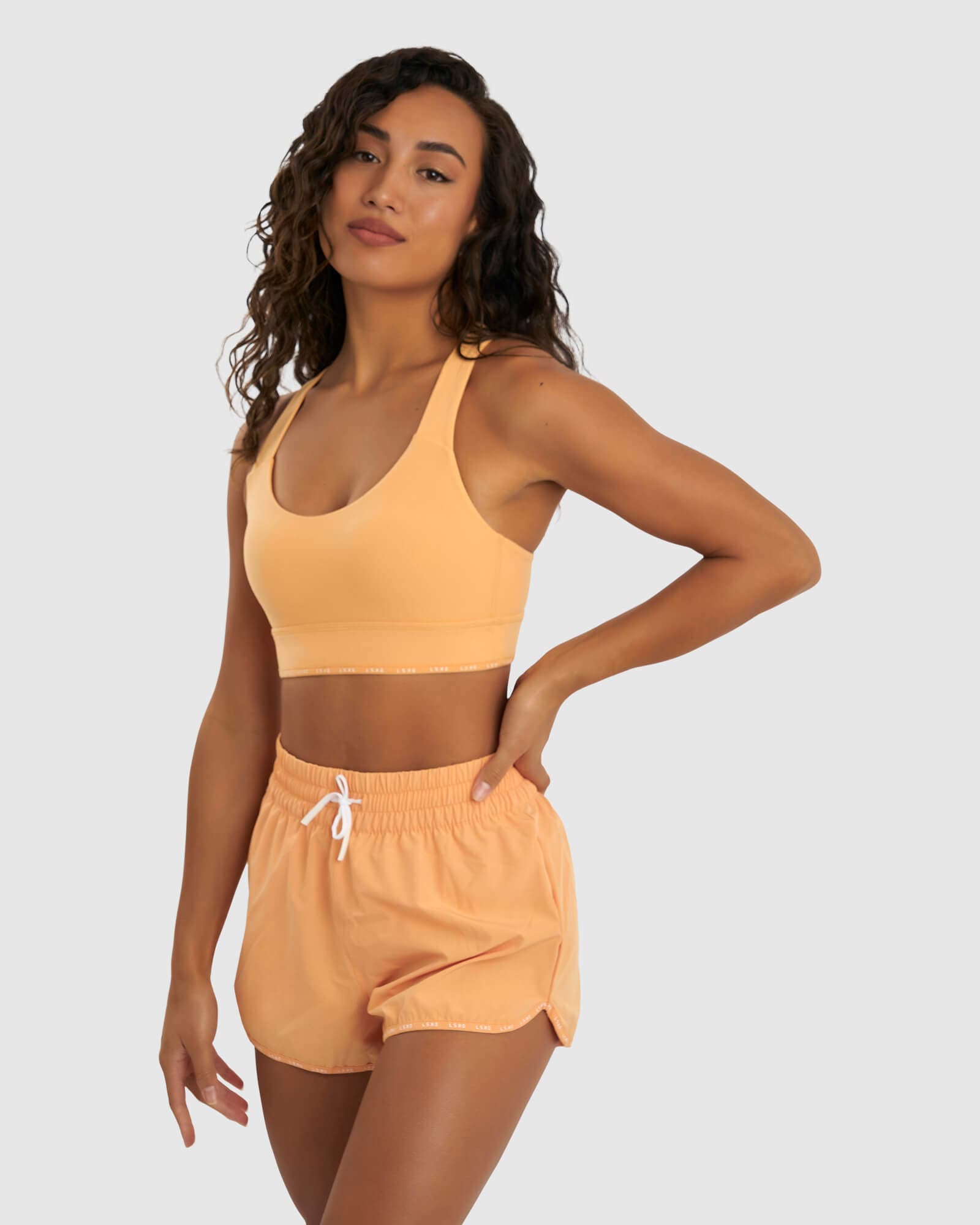 Model wearing MVP Sports Bra - Sherbet