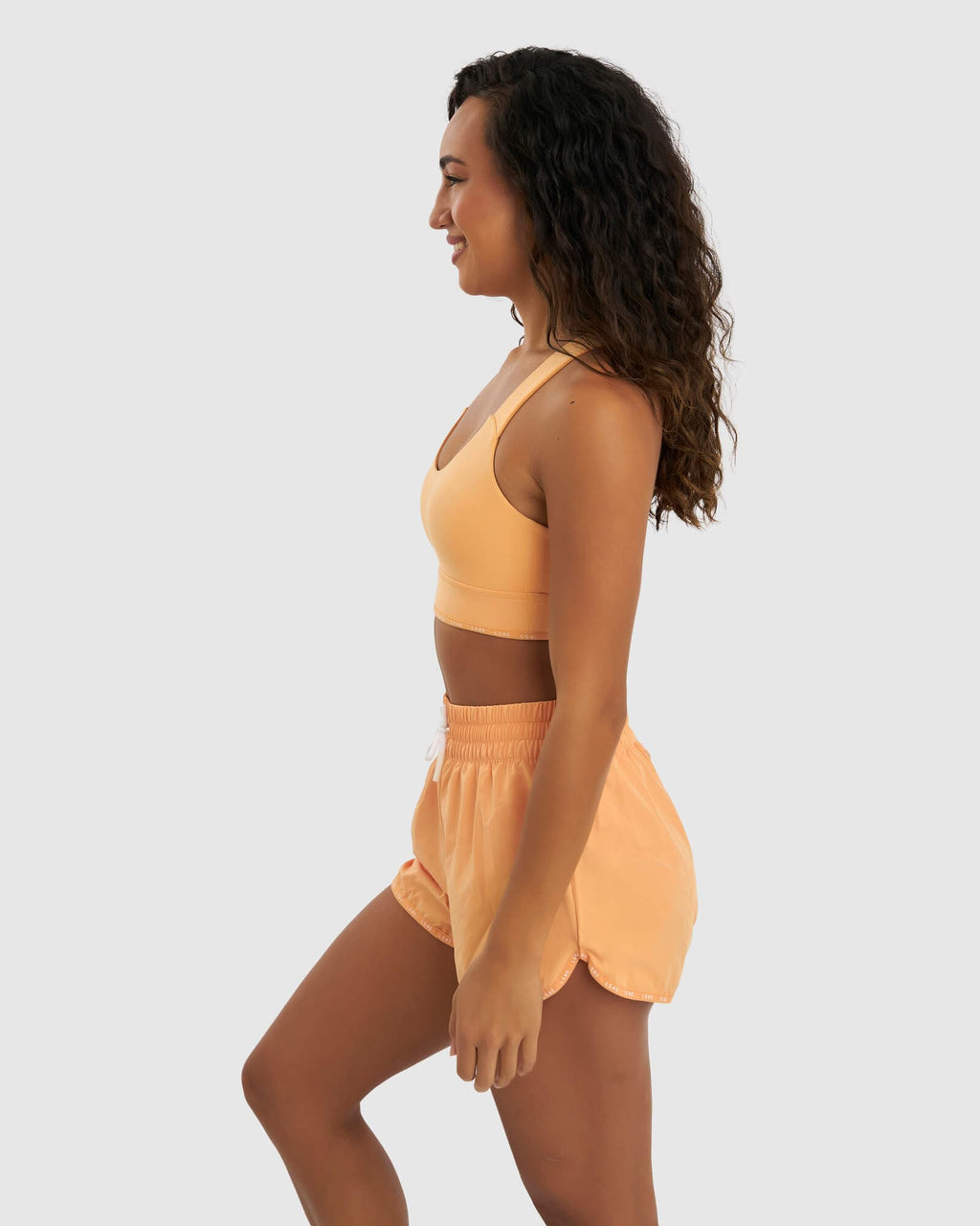 Model wearing MVP Sports Bra - Sherbet