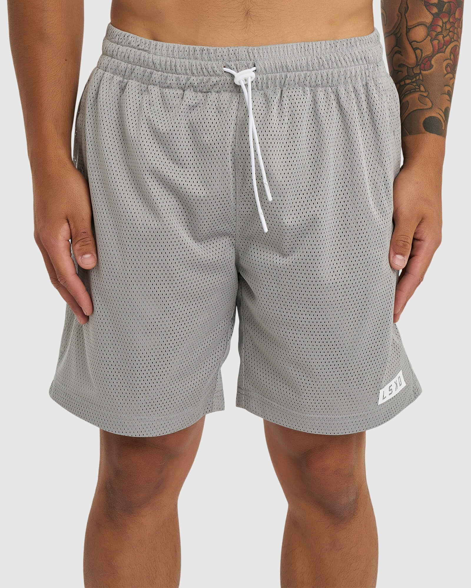 Model wearing Backboard 8" Performance Short - Alloy