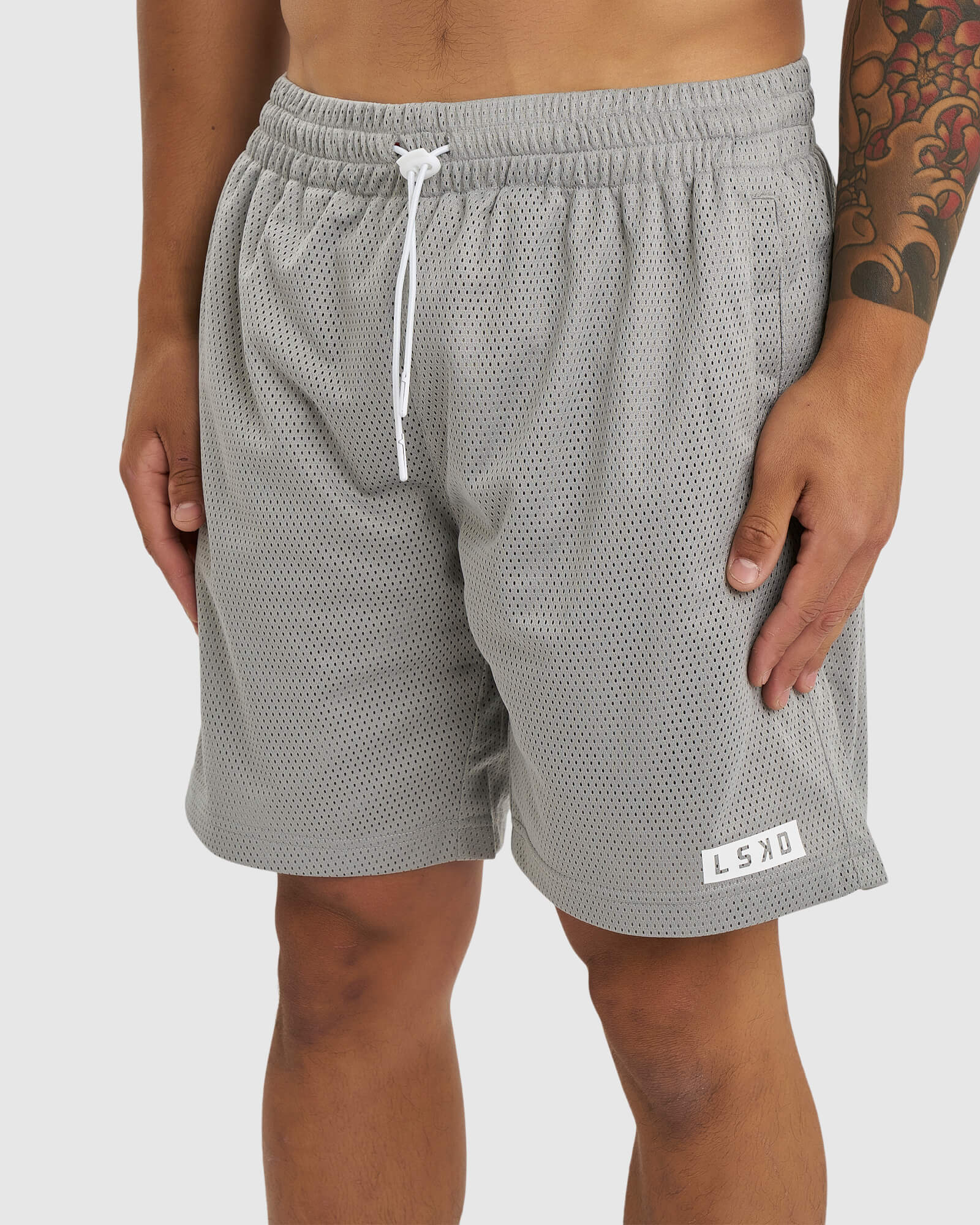 Model wearing Backboard 8" Performance Short - Alloy