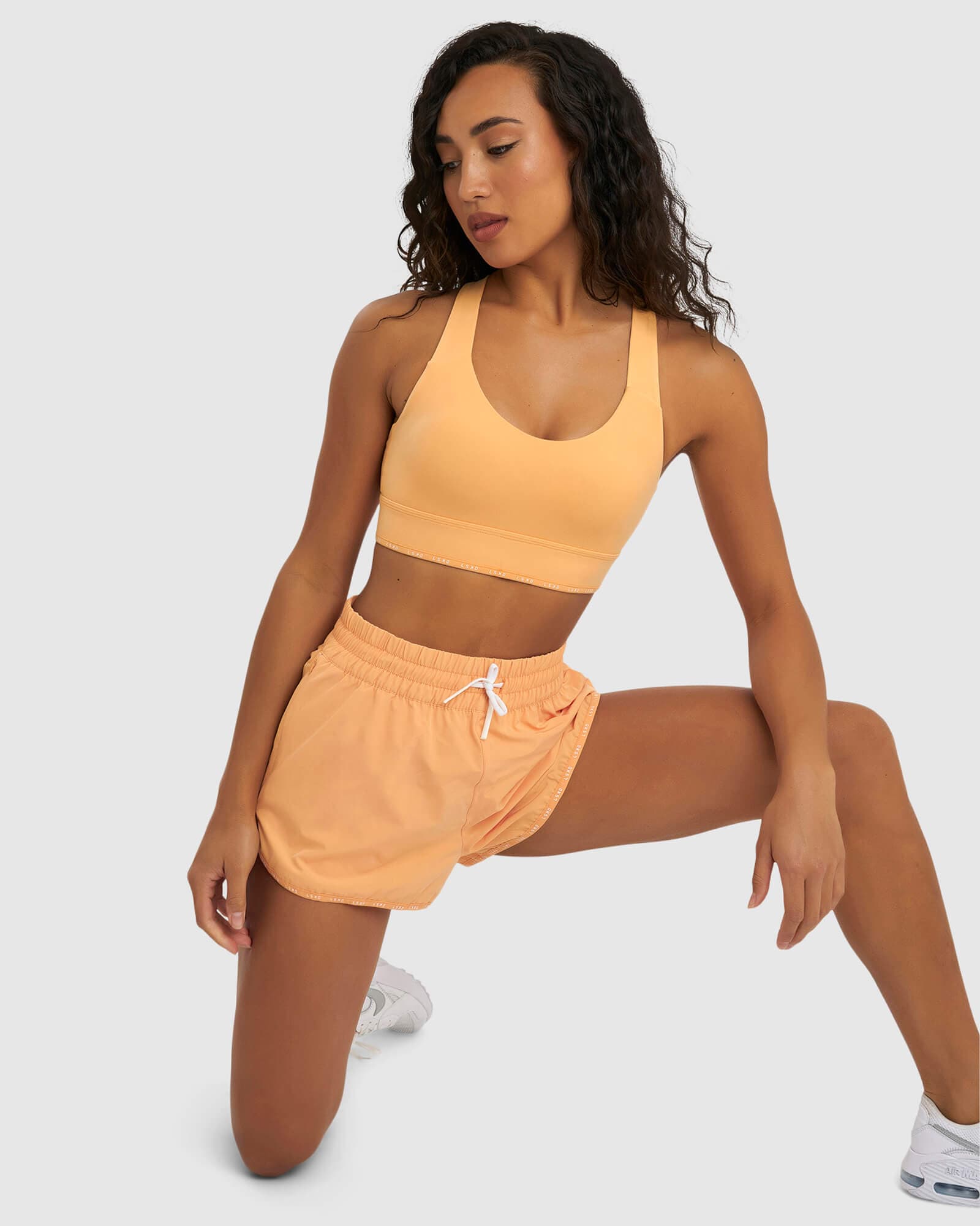 Model wearing MVP Sports Bra - Sherbet