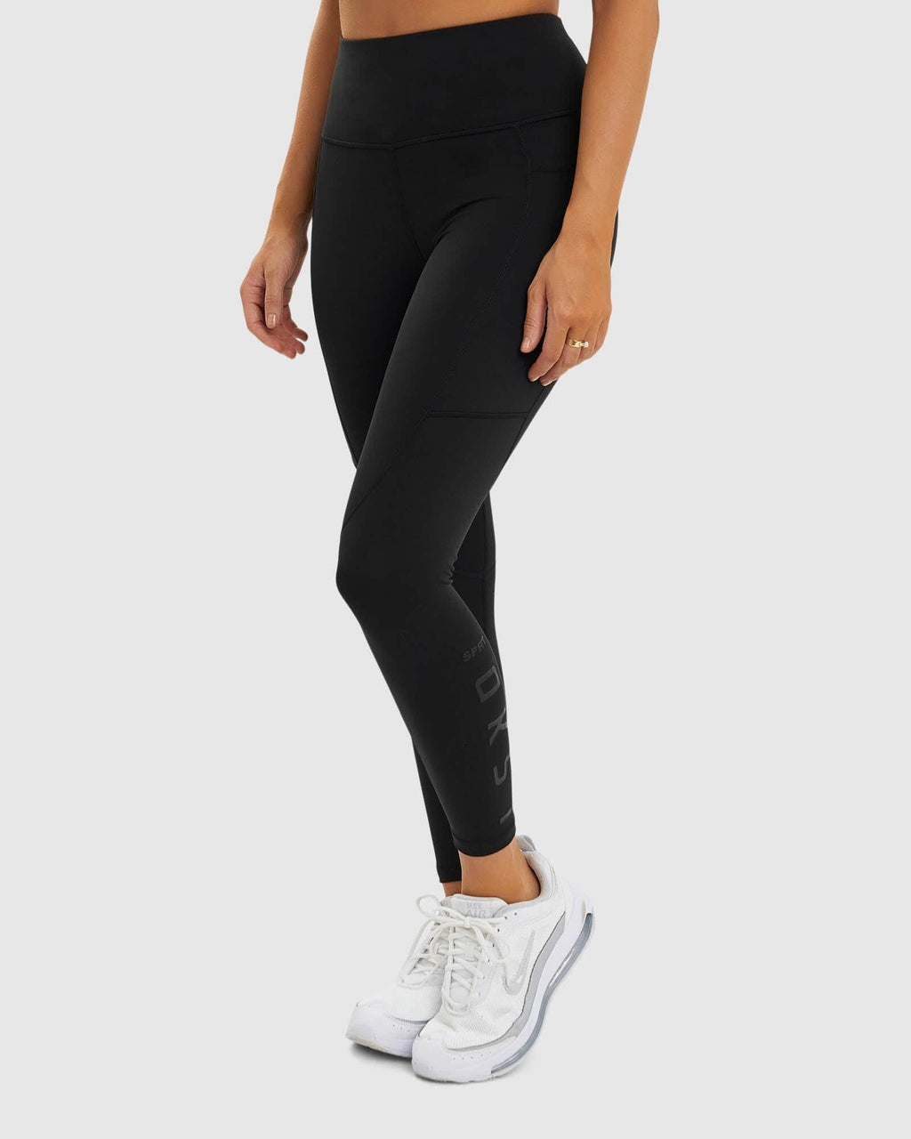 Model wearing SPRT 7/8 Length Tight - Black-Black