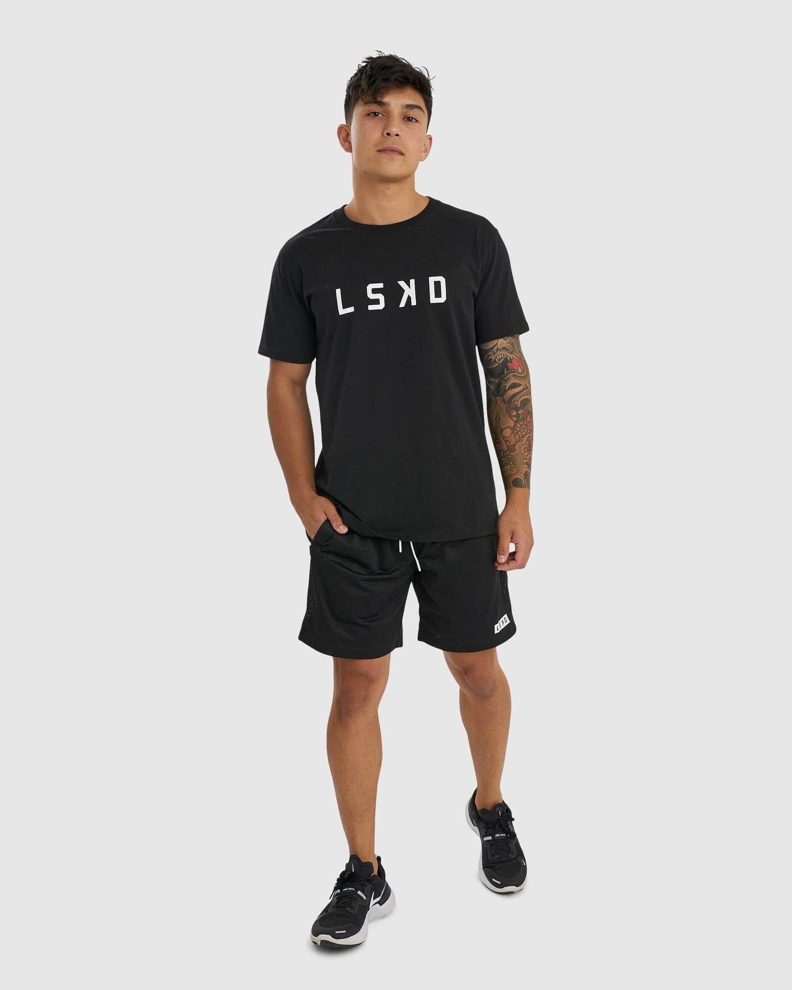 Model wearing Backboard 8" Performance Short - Black