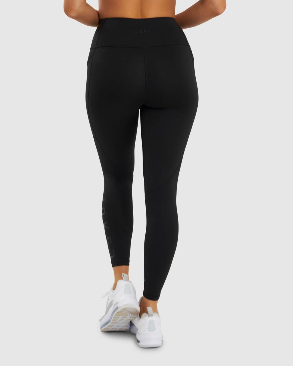 Model wearing SPRT 7/8 Length Tight - Black-Black