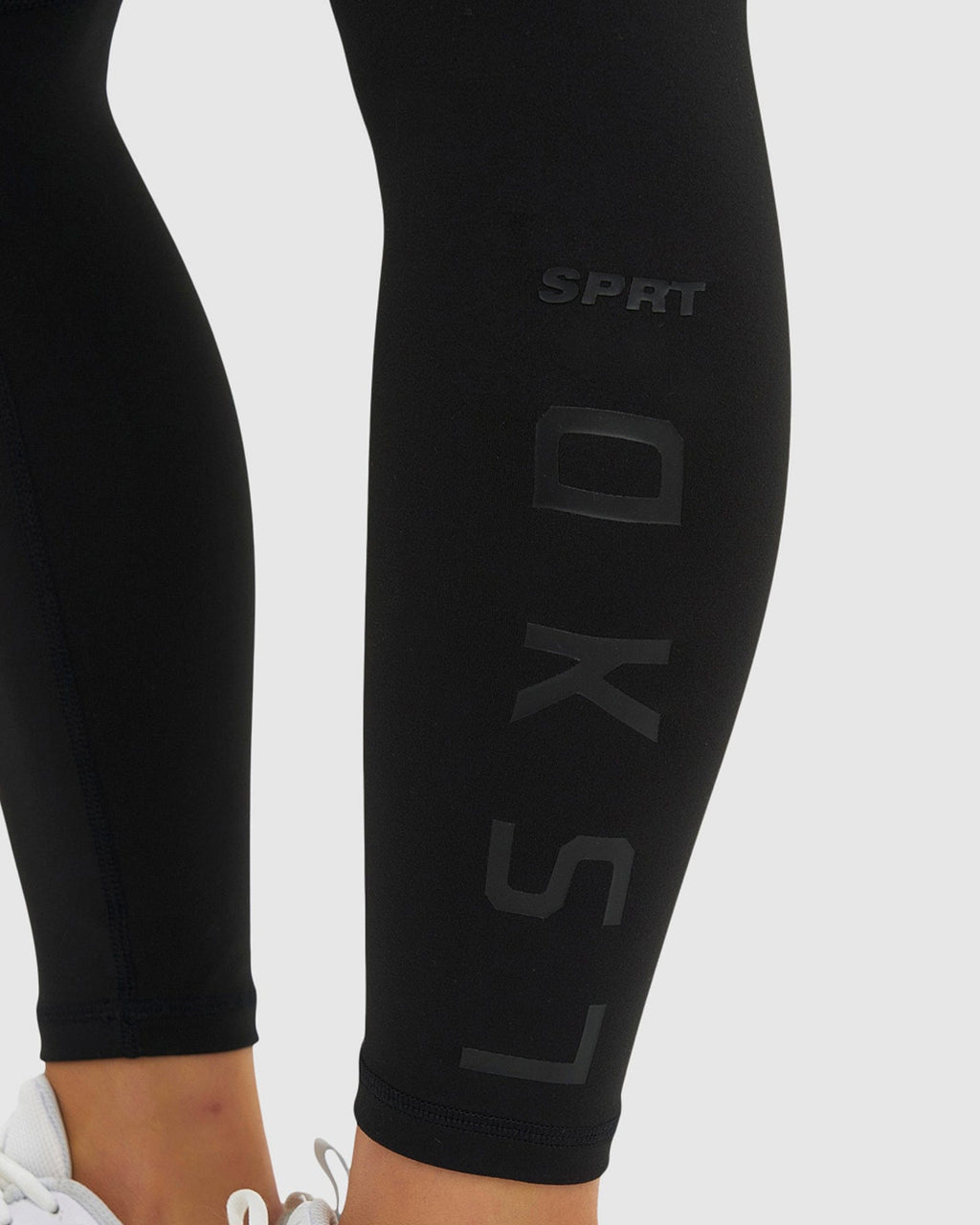 Model wearing SPRT 7/8 Length Tight - Black-Black