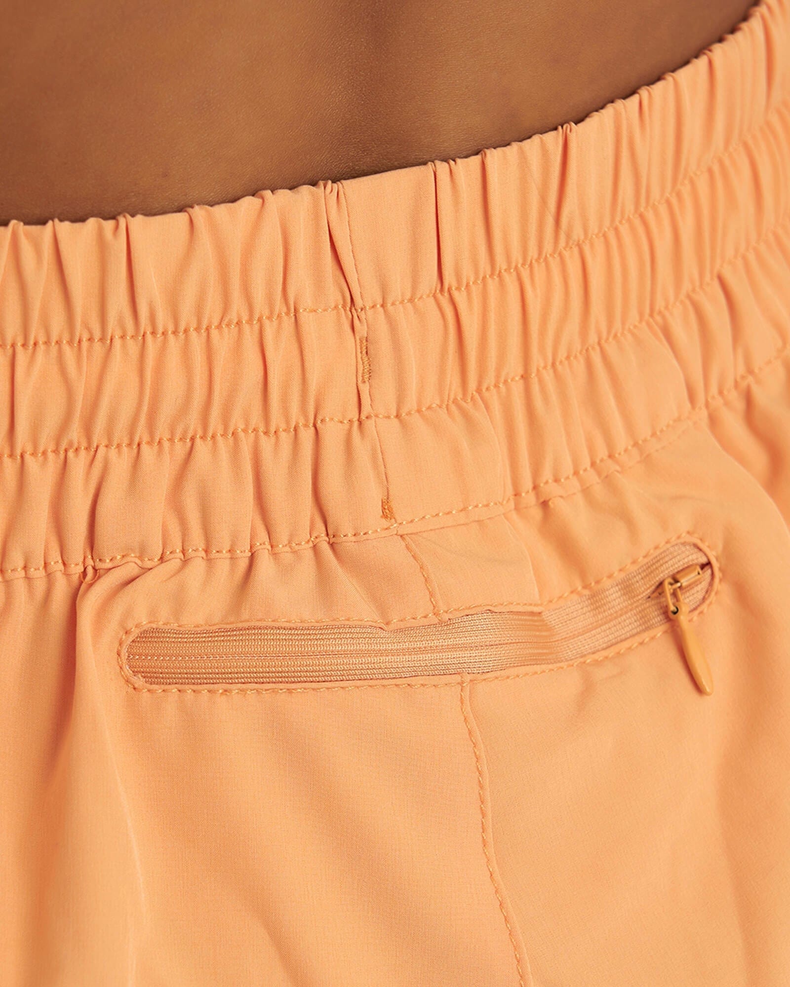 Model wearing MVP Run Short - Sherbet