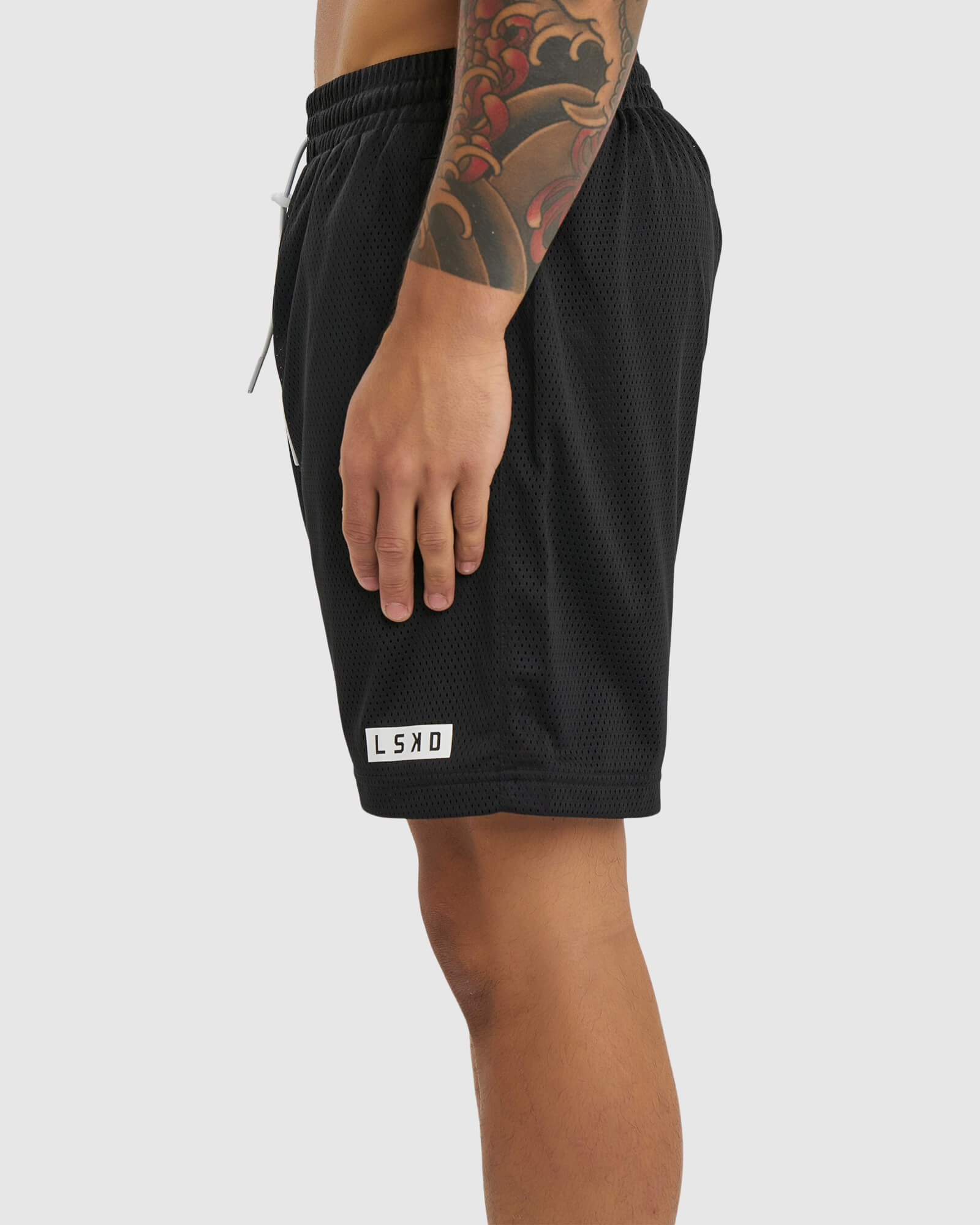Model wearing Backboard 8" Performance Short - Black
