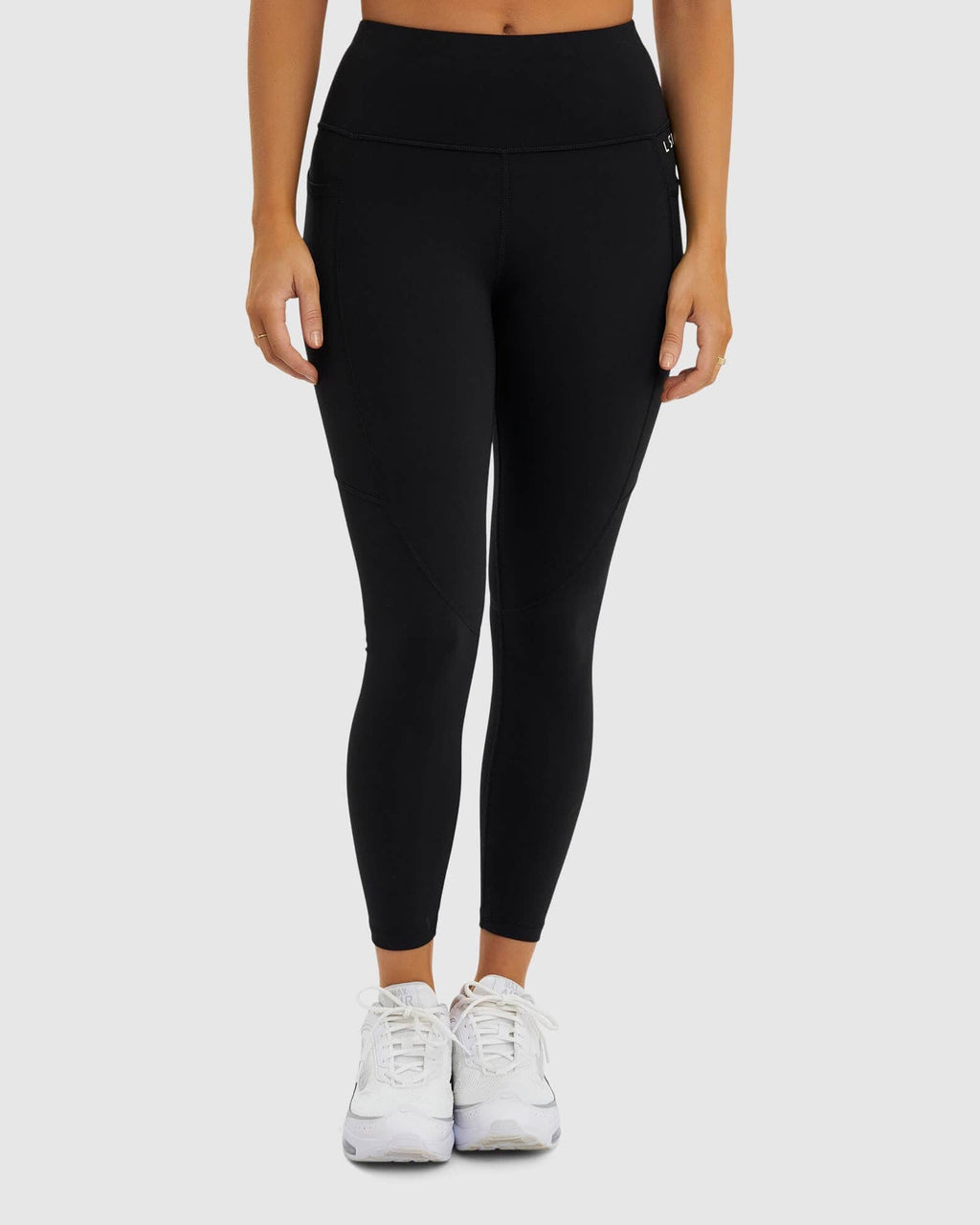 Model wearing Glide 7/8 Length Tight - Black-White