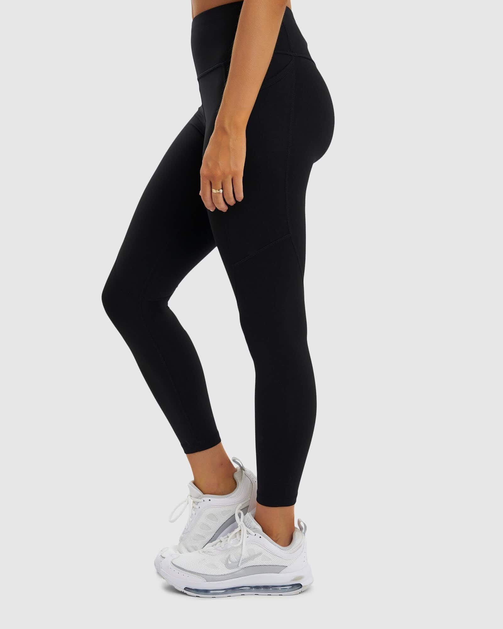 Model wearing Glide 7/8 Length Tight - Black-White