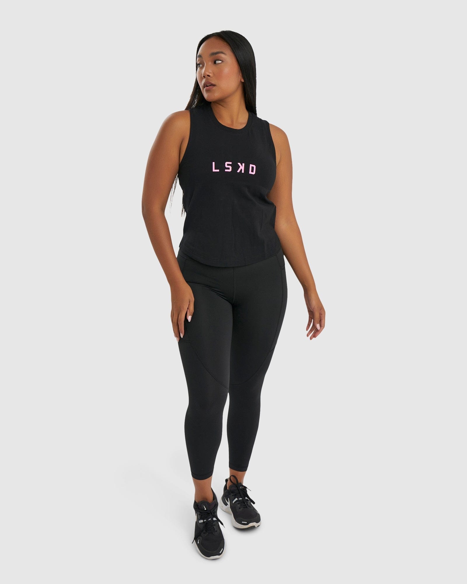 Model wearing Rep Tank - Black-Petal Pink