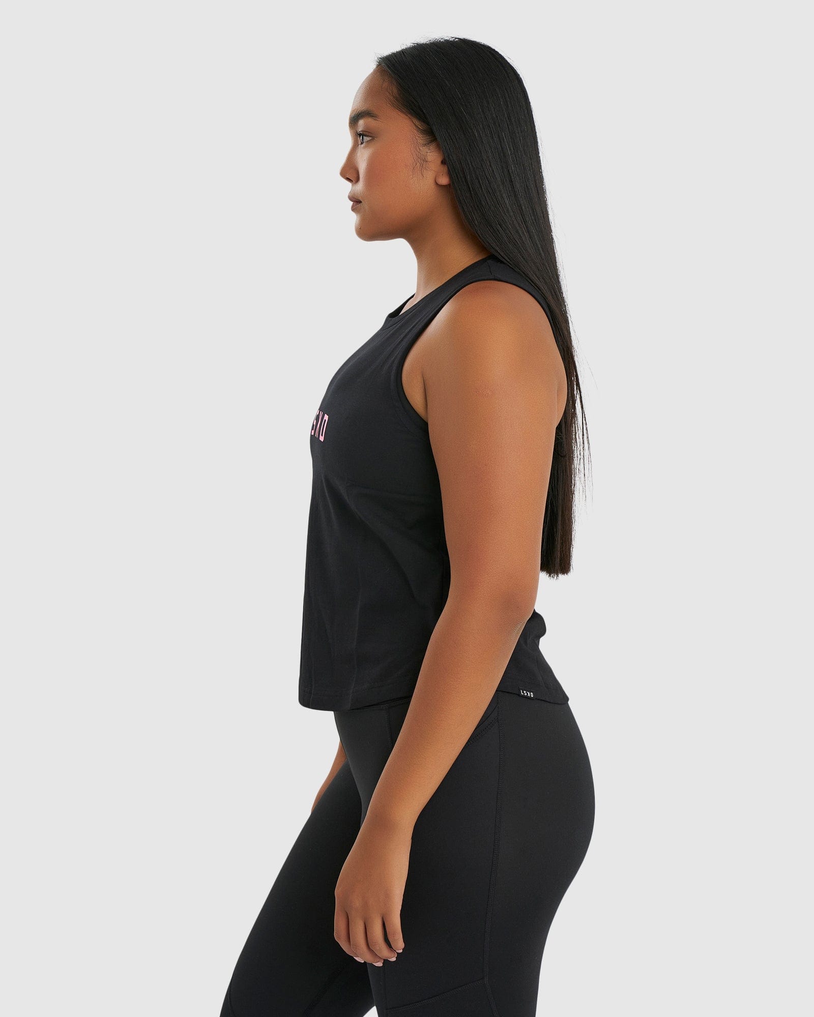 Model wearing Rep Tank - Black-Petal Pink