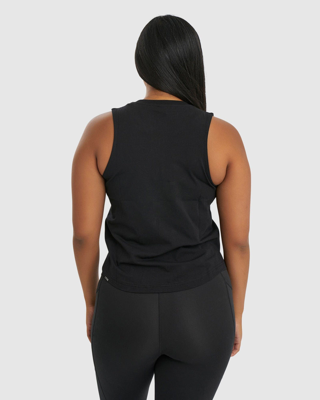 Model wearing Rep Tank - Black-Petal Pink